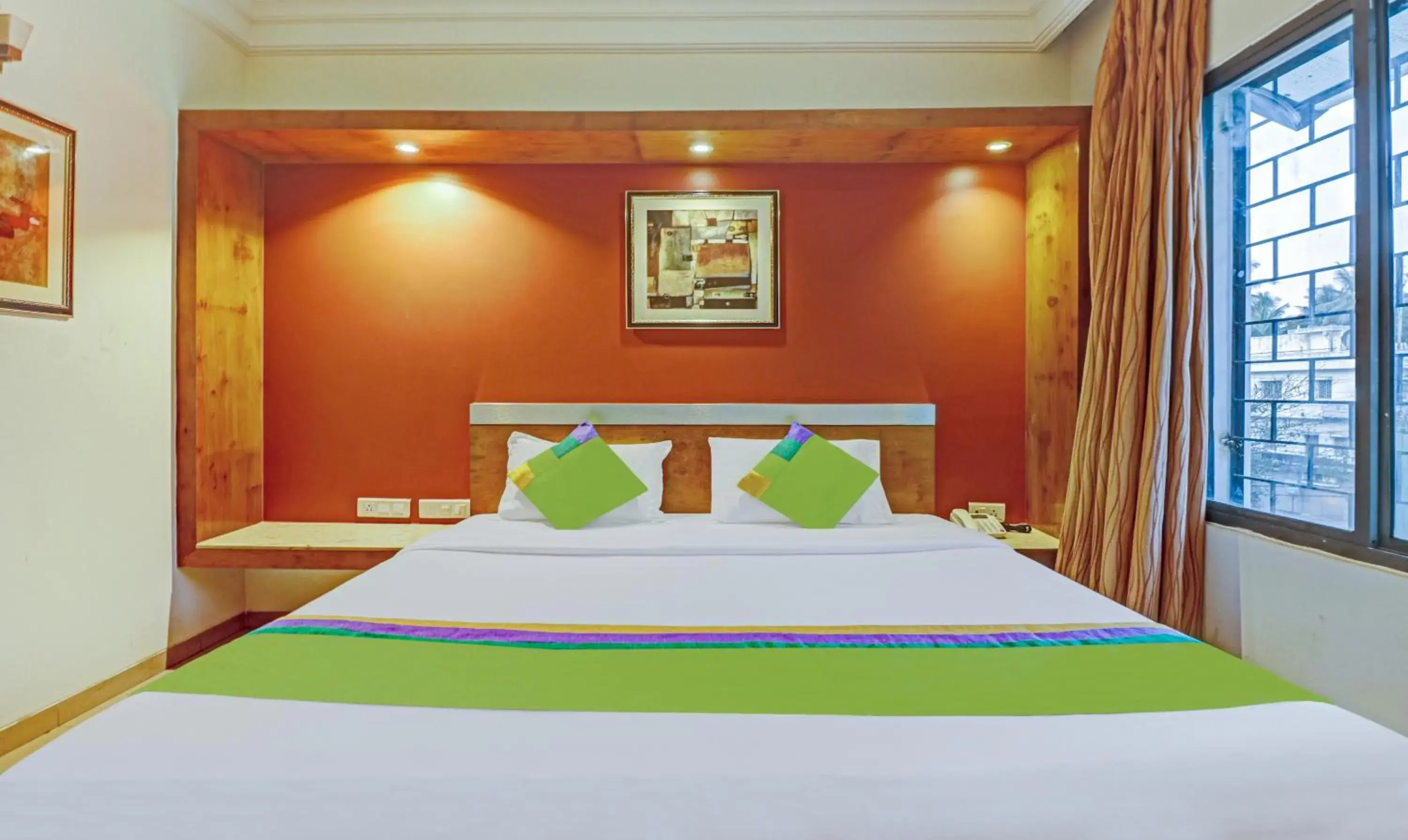 Bedroom, Bed in Treebo Suraksha Inn Bedroom, Bed in Treebo Suraksha Inn