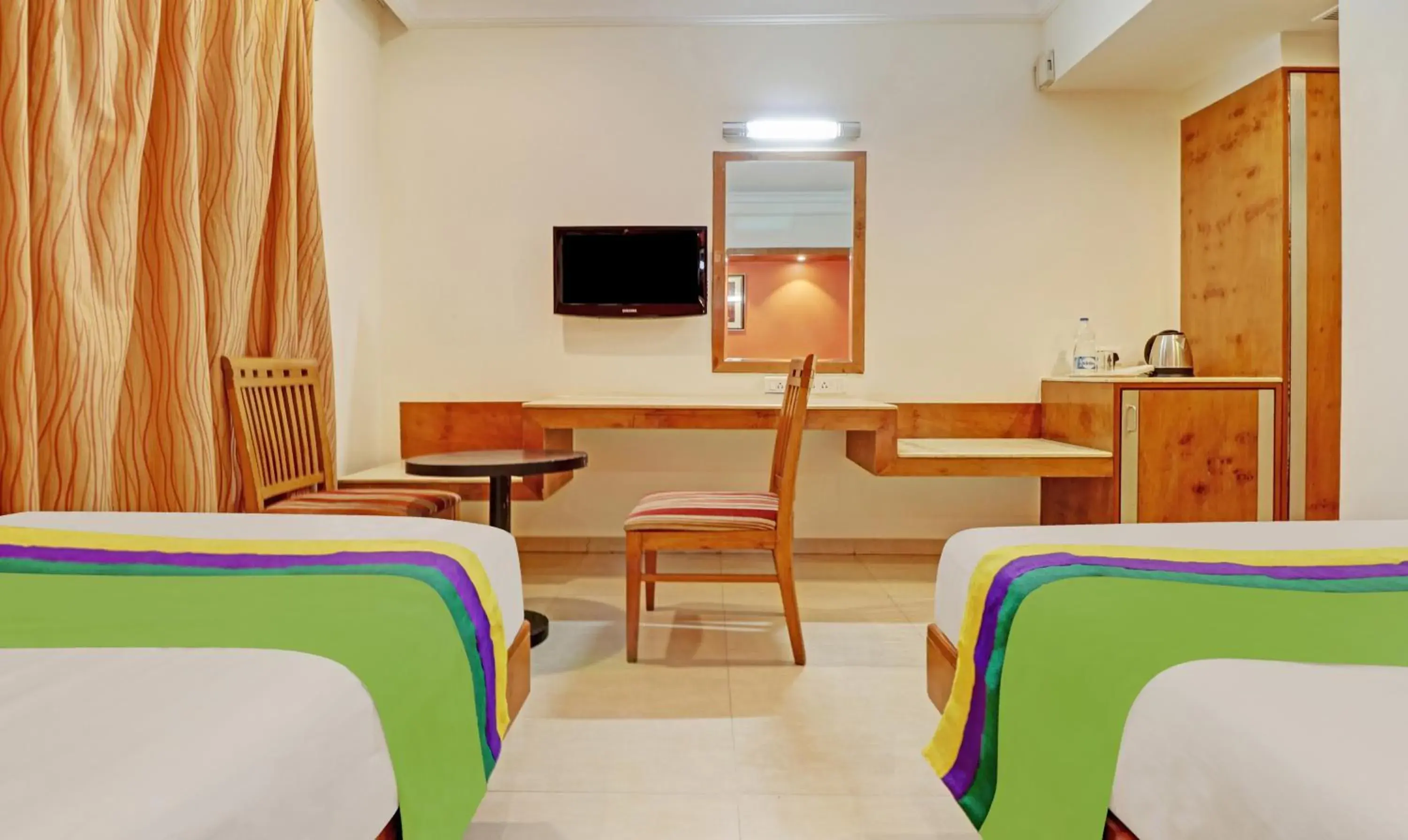 Bedroom, Bed in Treebo Suraksha Inn Bedroom, Bed in Treebo Suraksha Inn