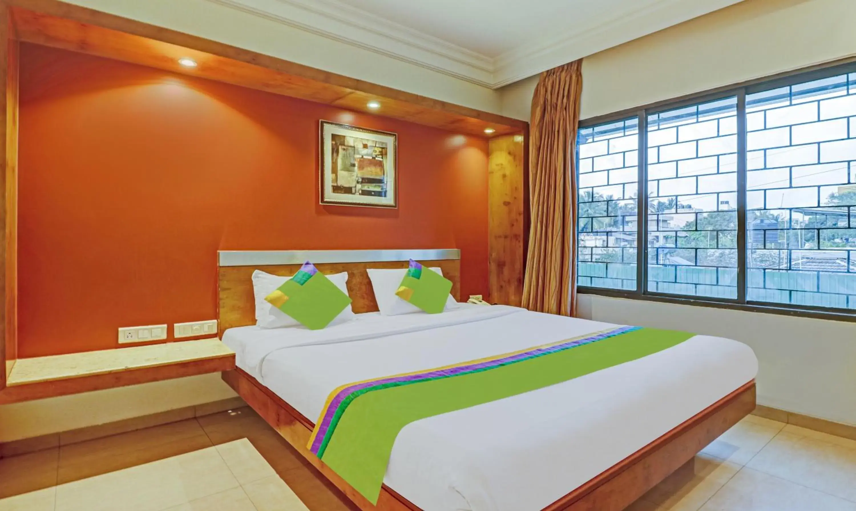 Bedroom, Bed in Treebo Suraksha Inn Bedroom, Bed in Treebo Suraksha Inn