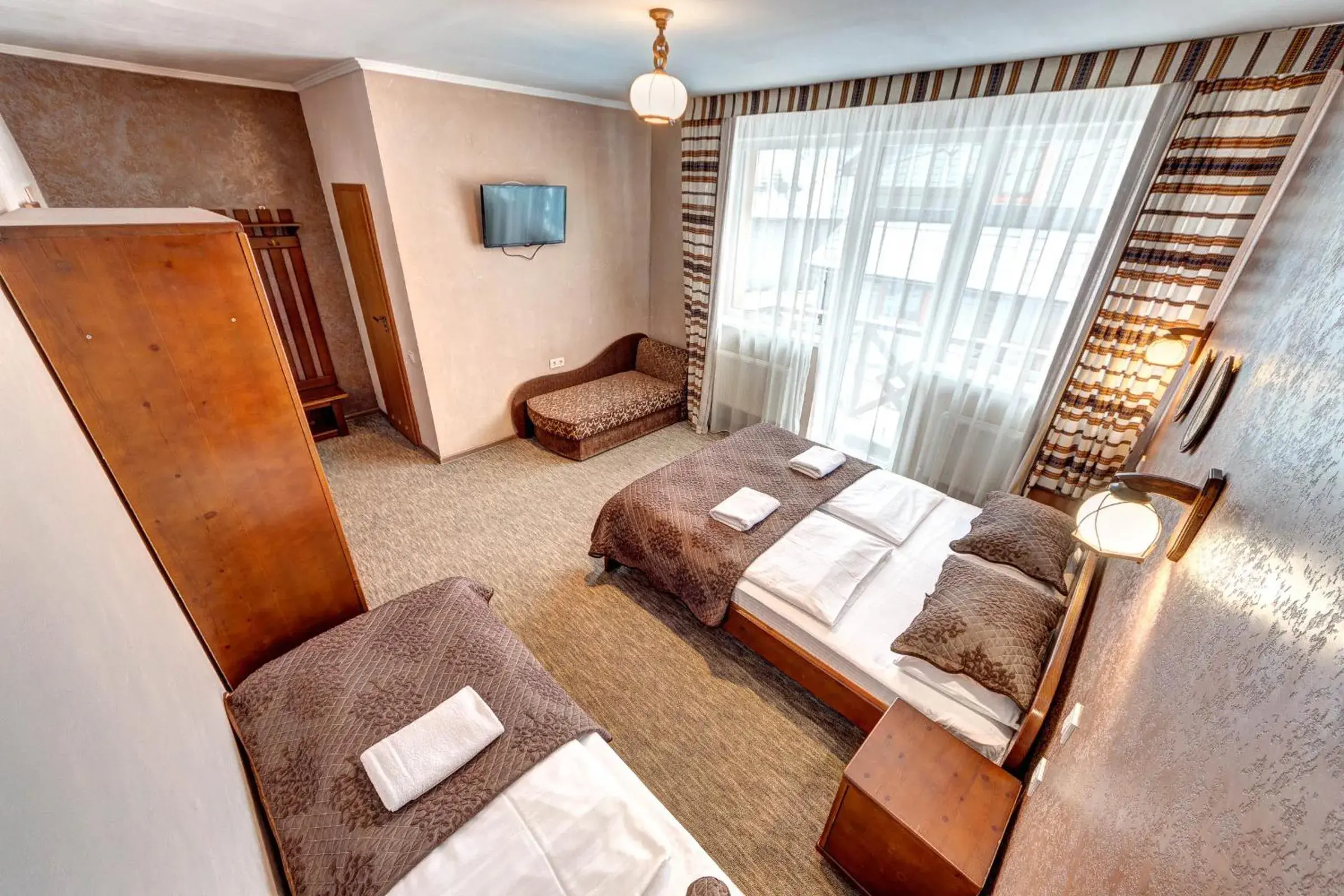 Superior Triple Room in Hotel Gutsulia Superior Triple Room in Hotel Gutsulia