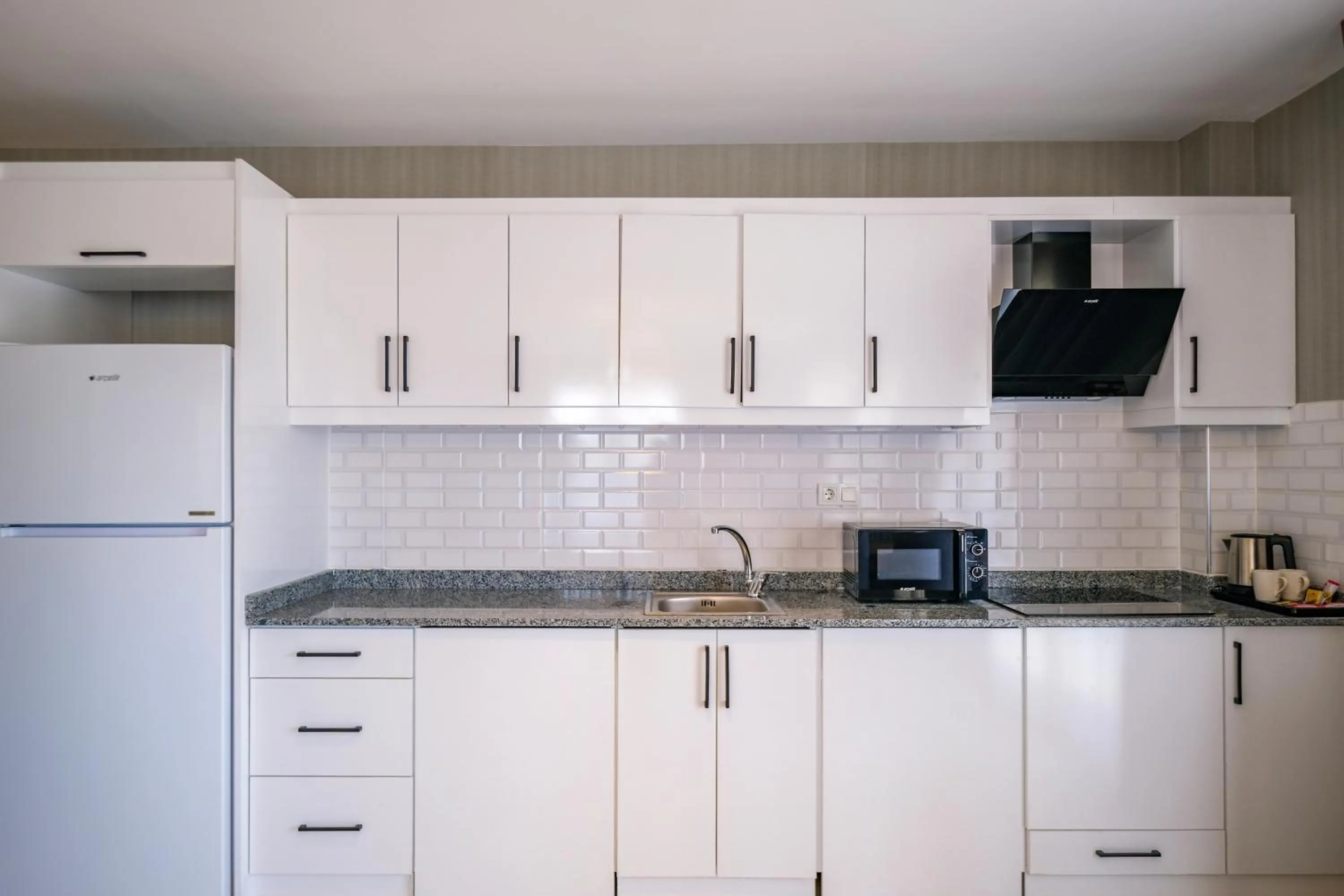 Kitchen or kitchenette in Days Inn by Wyndham Alanya