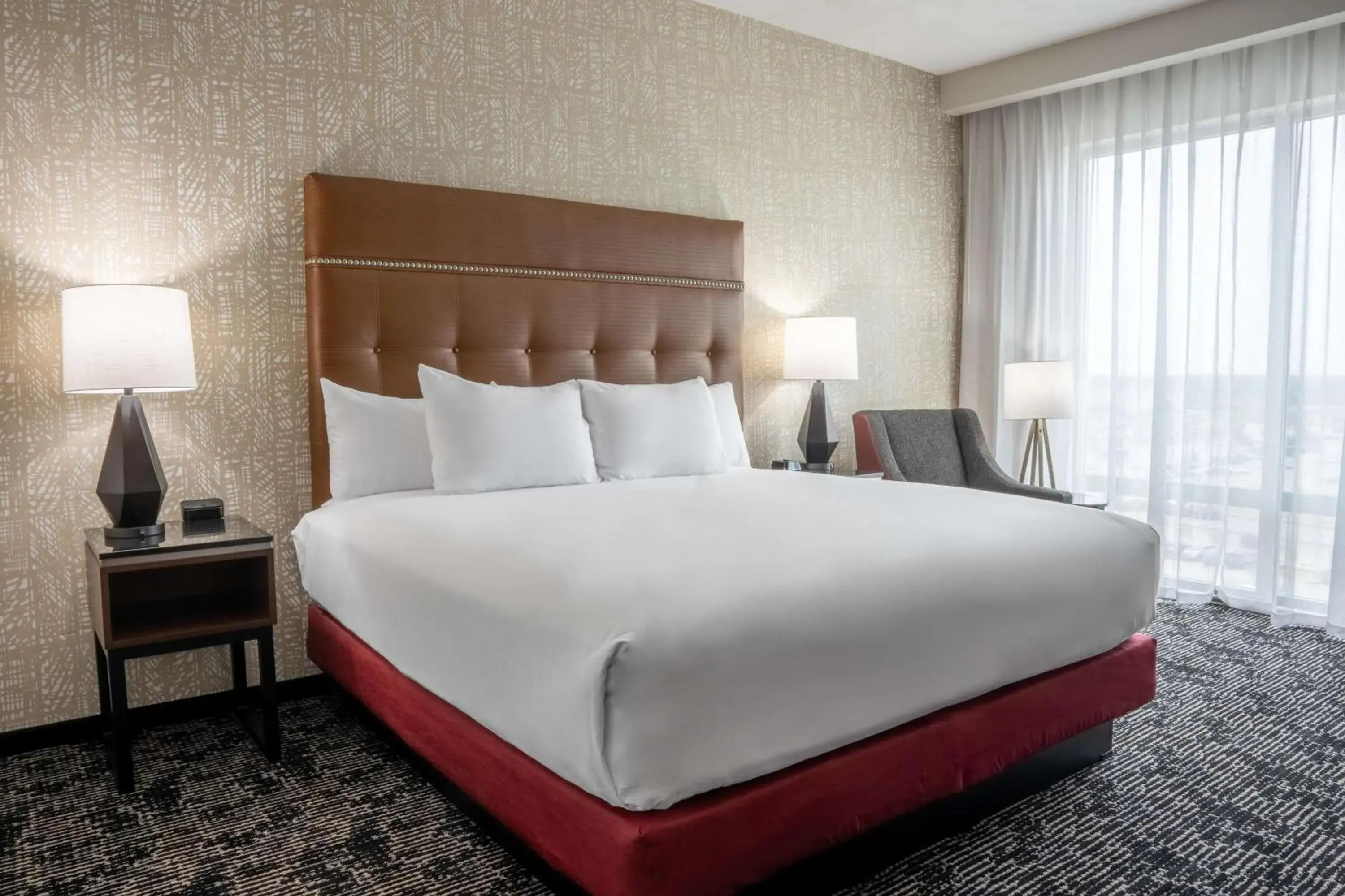 Upper Floor King Suite with Sofa Bed - Hearing Accessible, Roll-In Shower in Drury Plaza Hotel College Station Upper Floor King Suite with Sofa Bed - Hearing Accessible, Roll-In Shower in Drury Plaza Hotel College Station