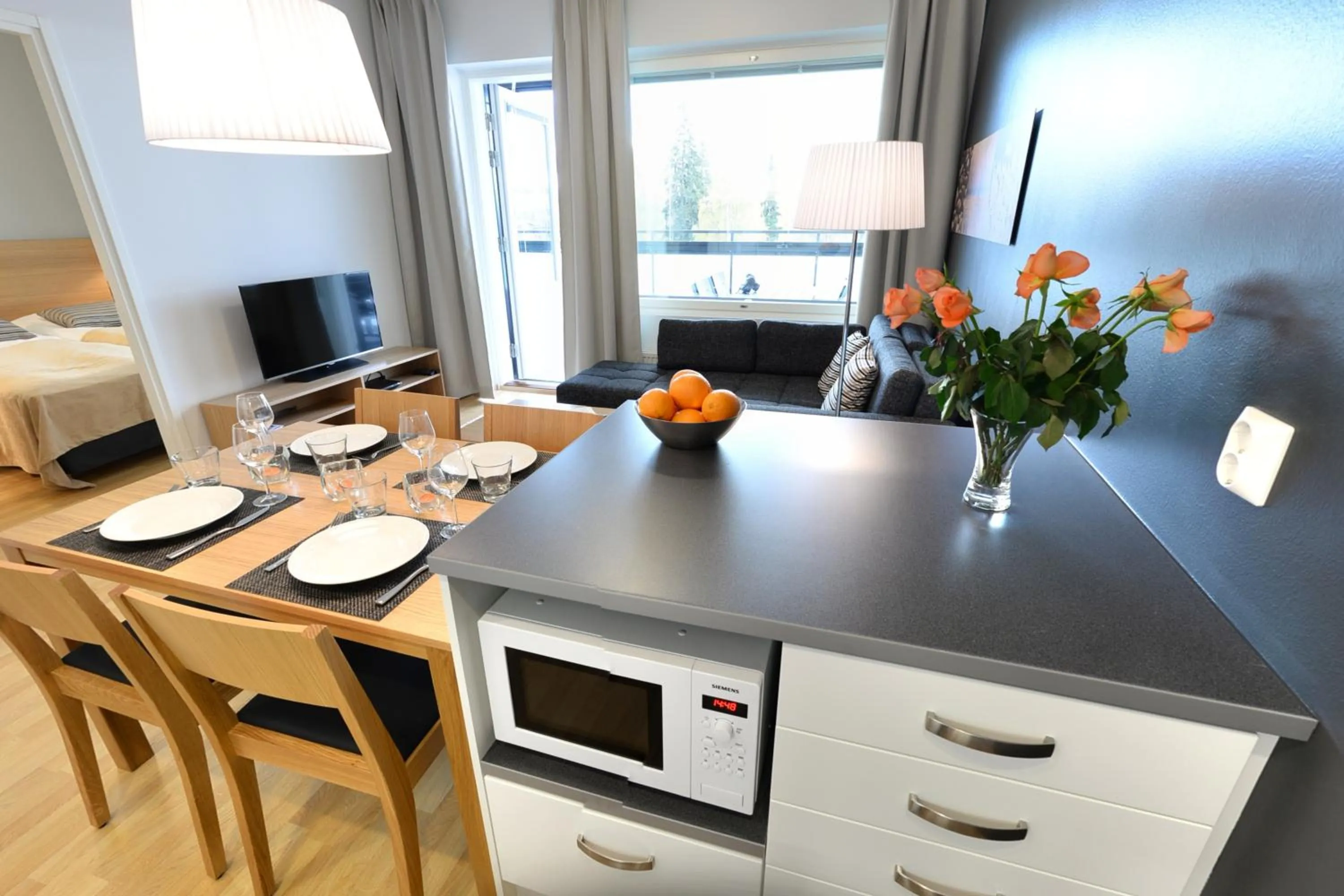 Kitchen or kitchenette in Forenom Serviced Apartments Tampere Pyynikki
