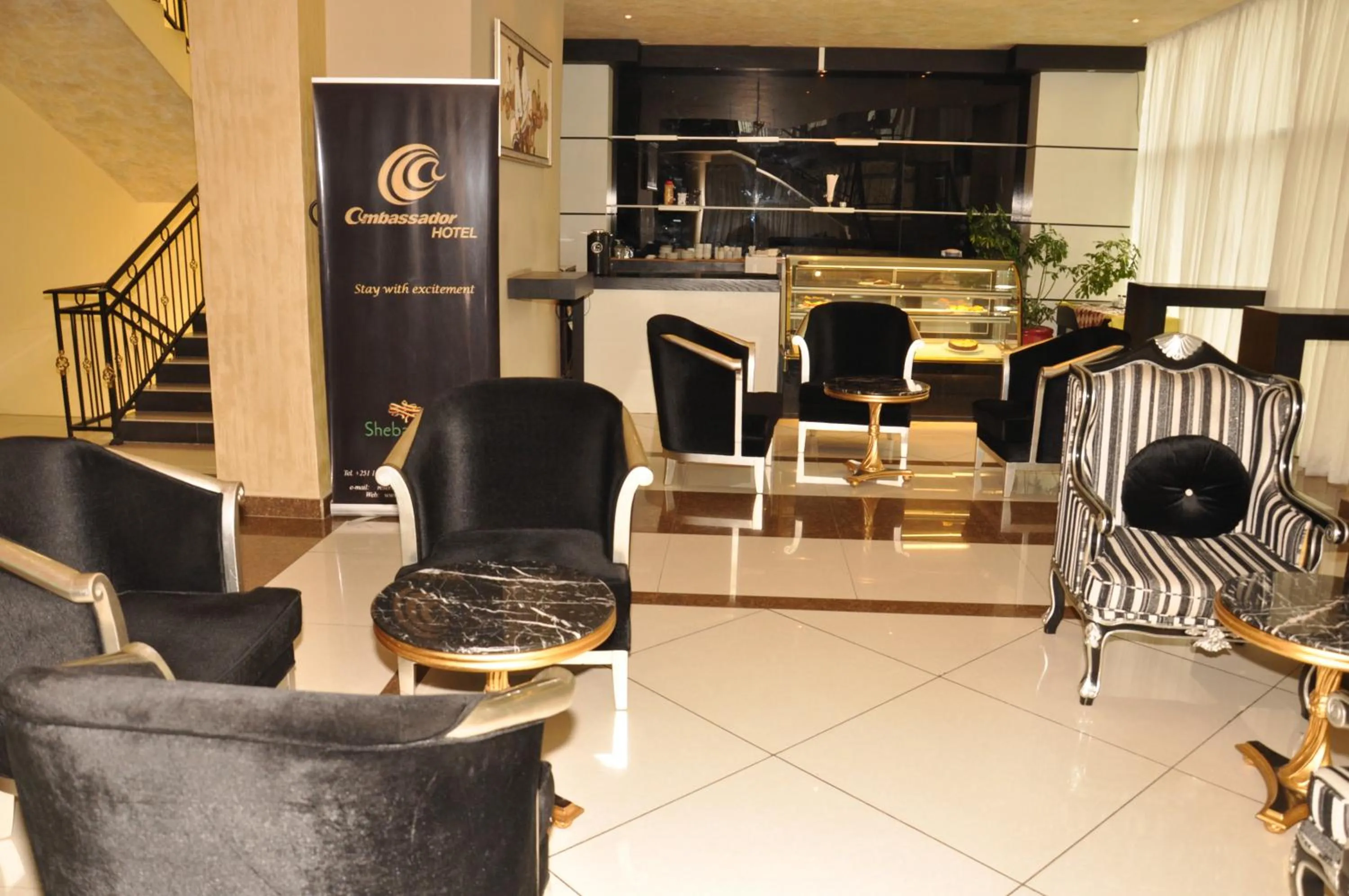 Lobby or reception in Ambassador Hotel