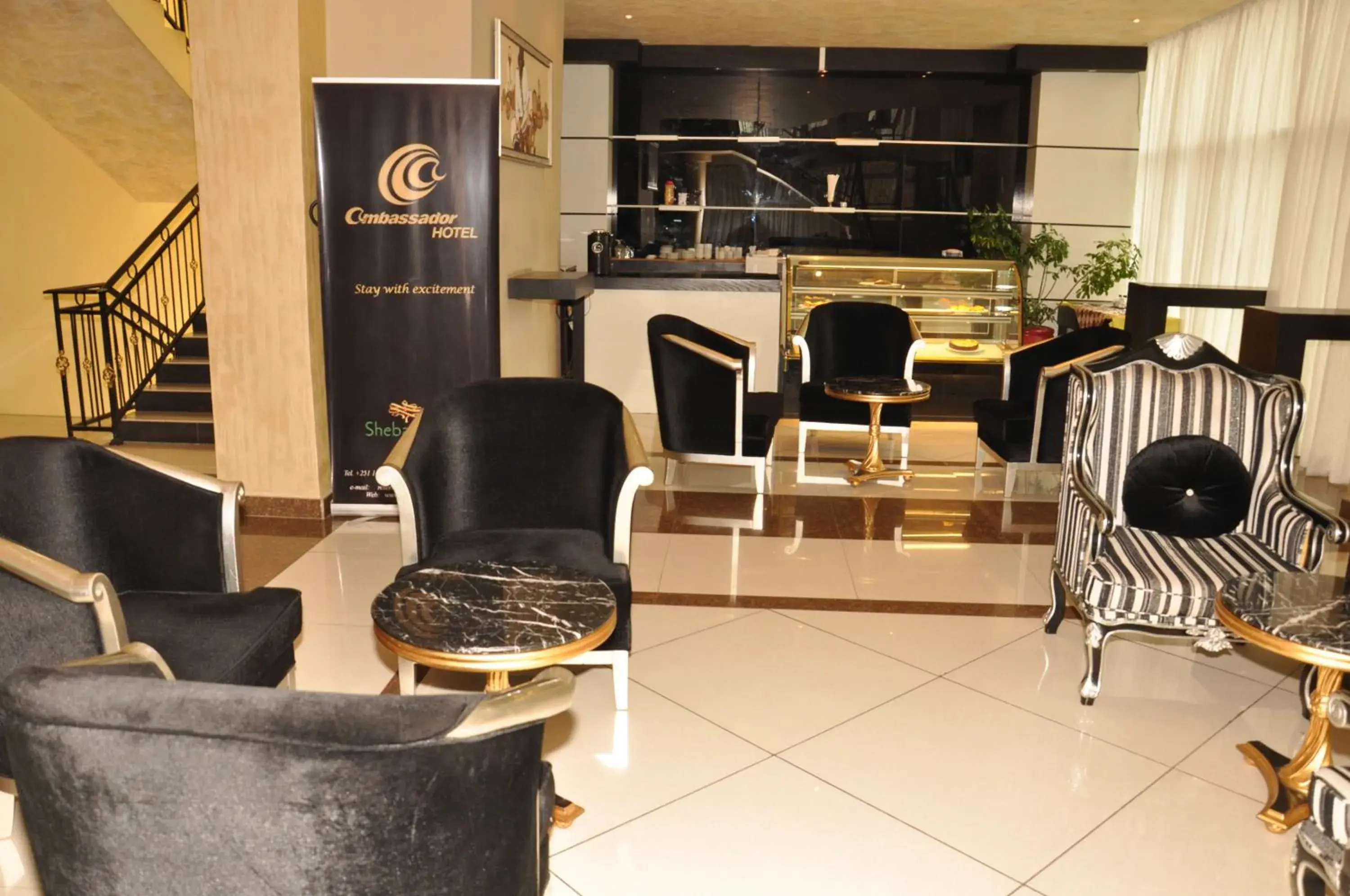 Lobby or reception in Ambassador Hotel Lobby or reception in Ambassador Hotel