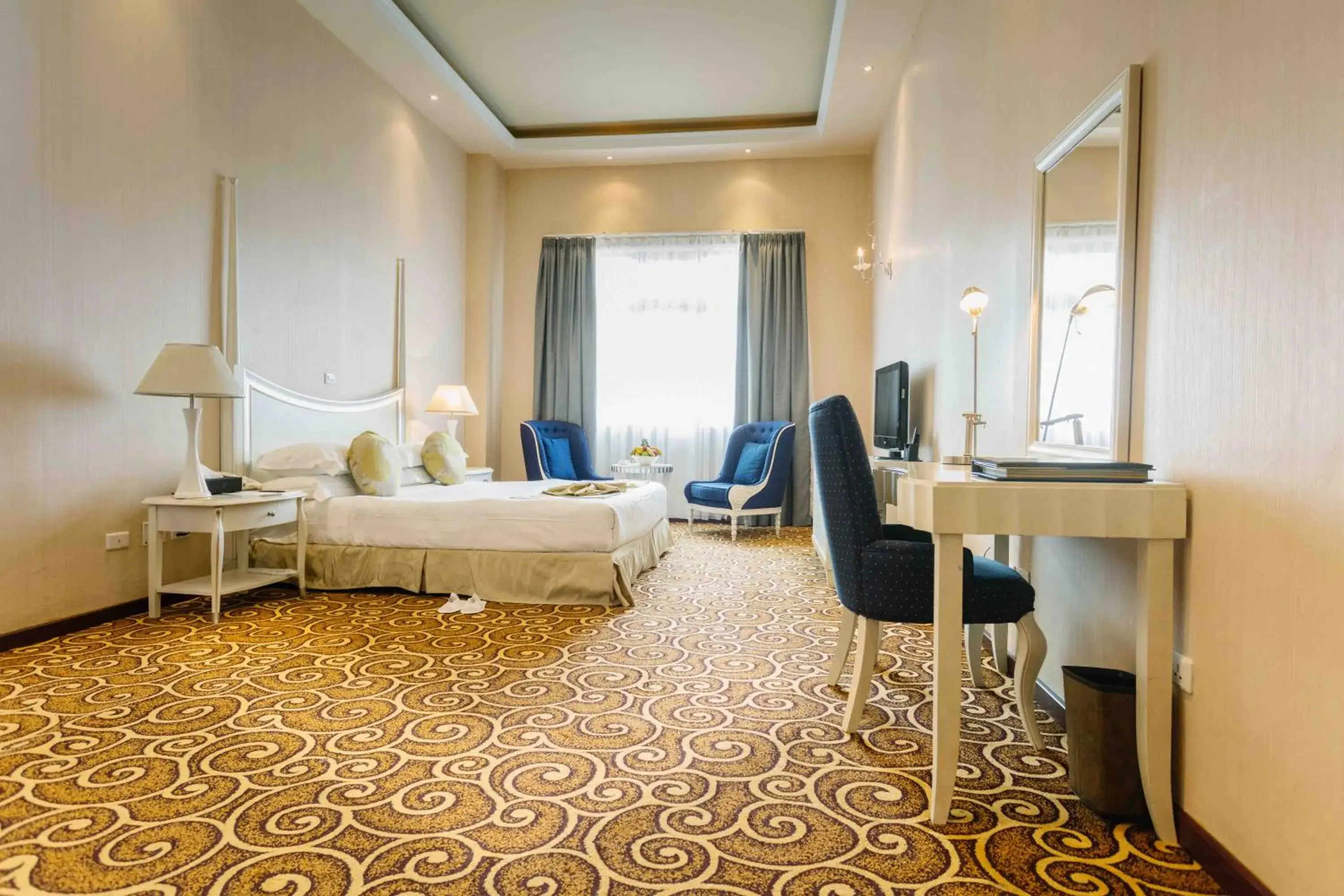 Bedroom in Ambassador Hotel Bedroom in Ambassador Hotel