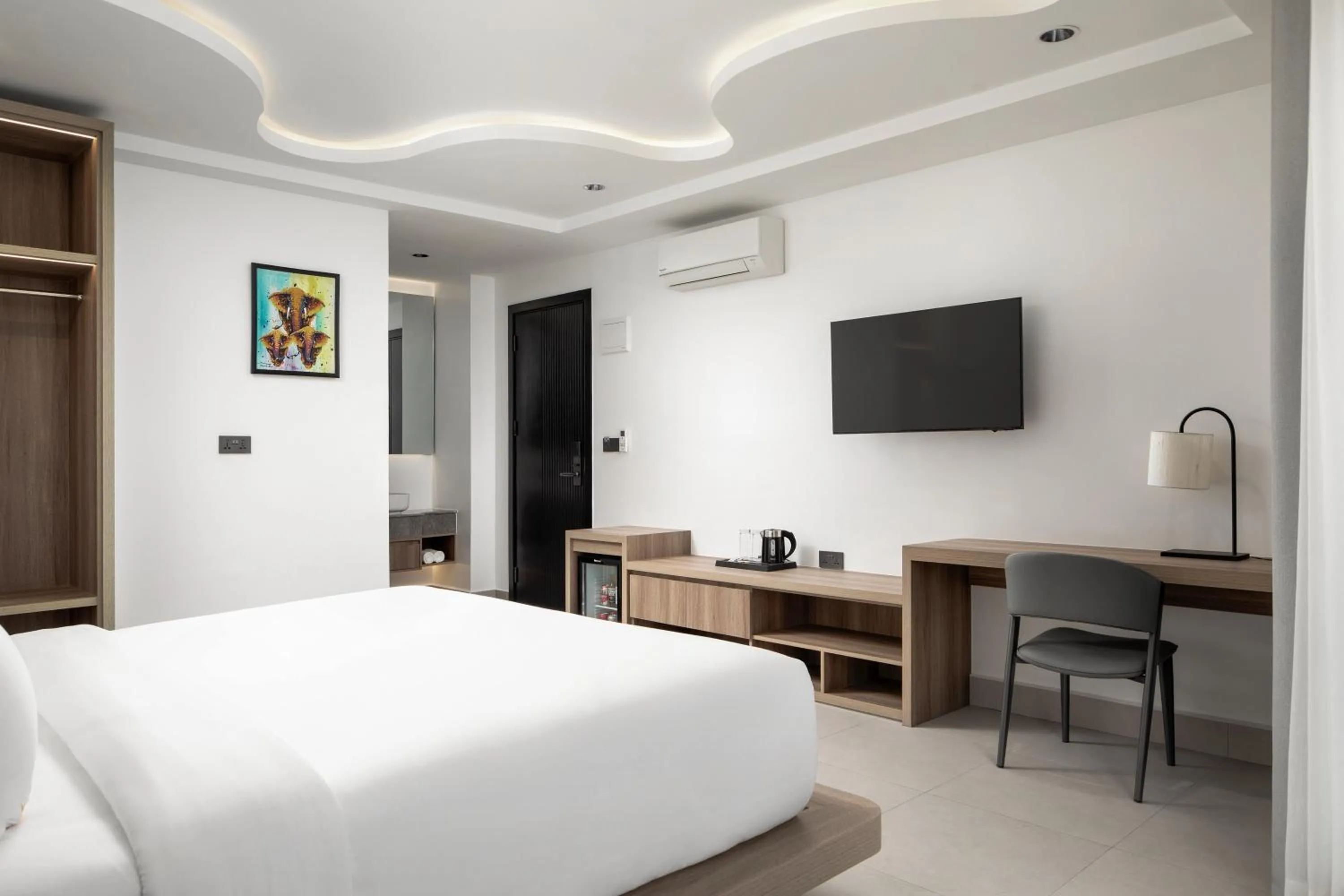 Bed in Chaiya Palace Hotel