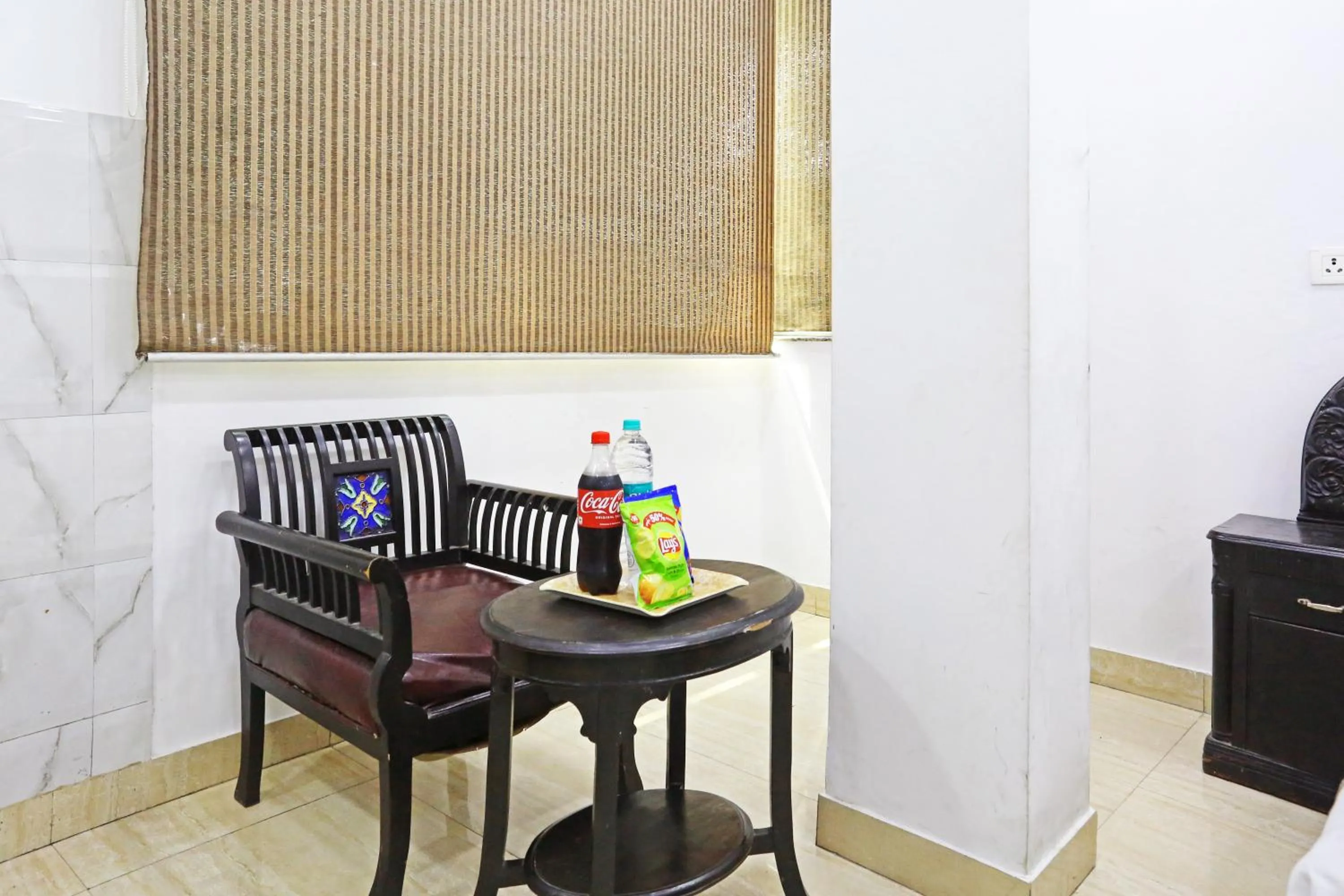 Seating area in Mauryan Elite Hotel Lajpat Nager
