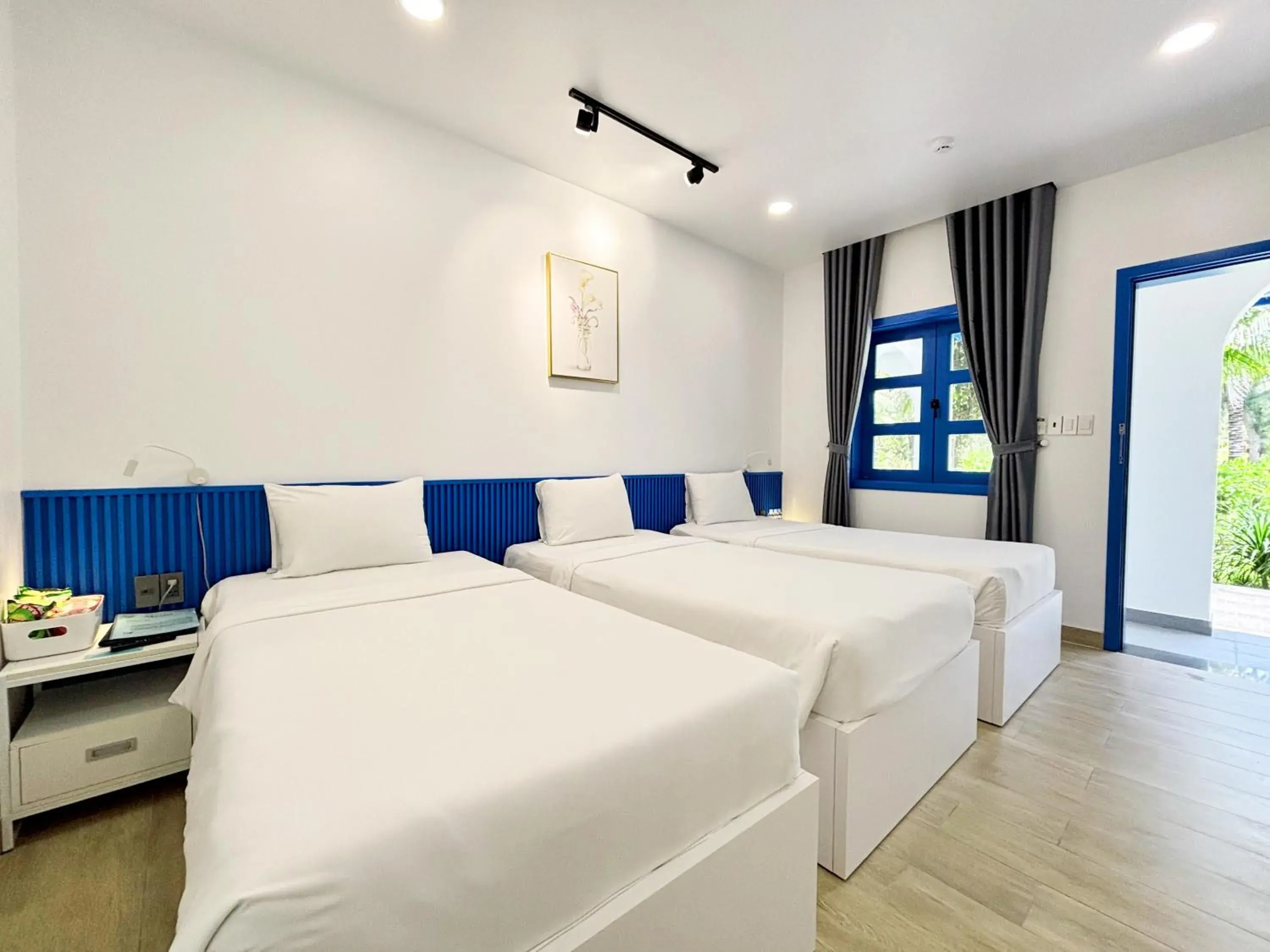 Bed in KIGI Beach Resort Bed in KIGI Beach Resort