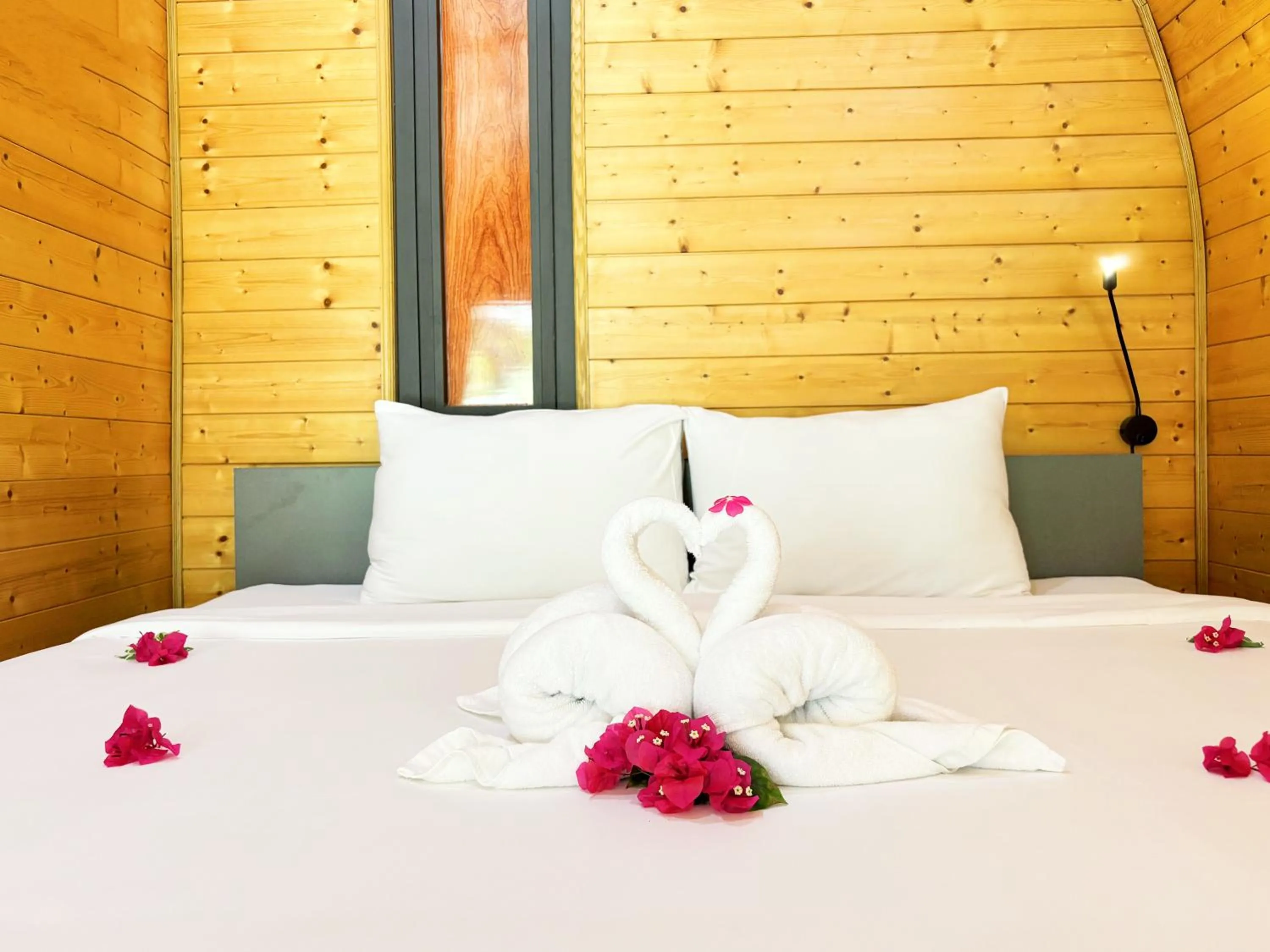 Bed in KIGI Beach Resort