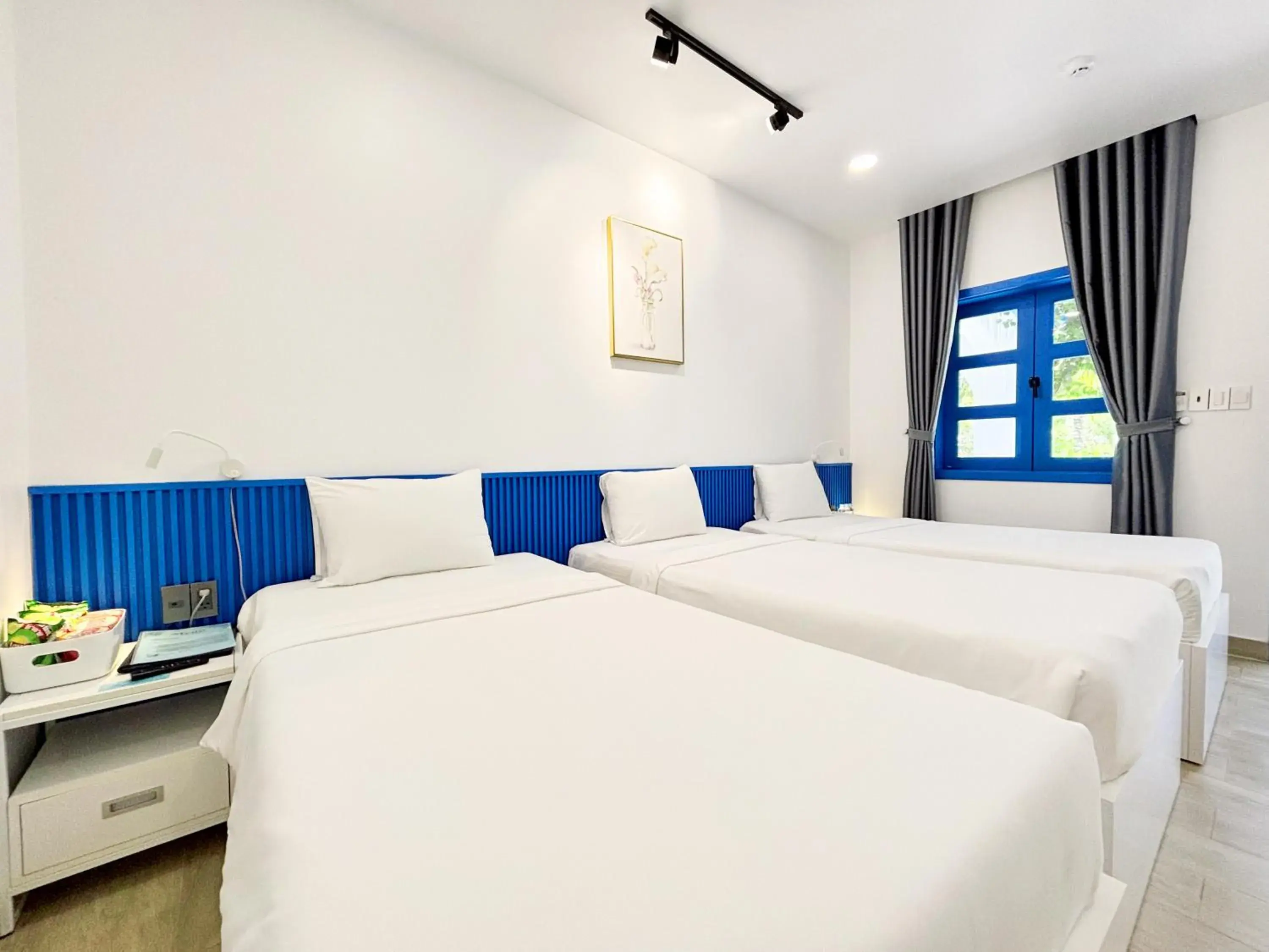 Bed in KIGI Beach Resort Bed in KIGI Beach Resort