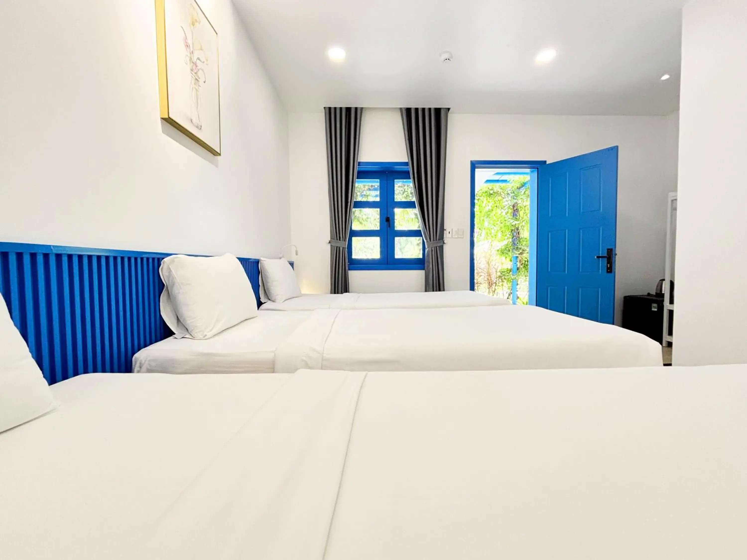 Bed in KIGI Beach Resort Bed in KIGI Beach Resort