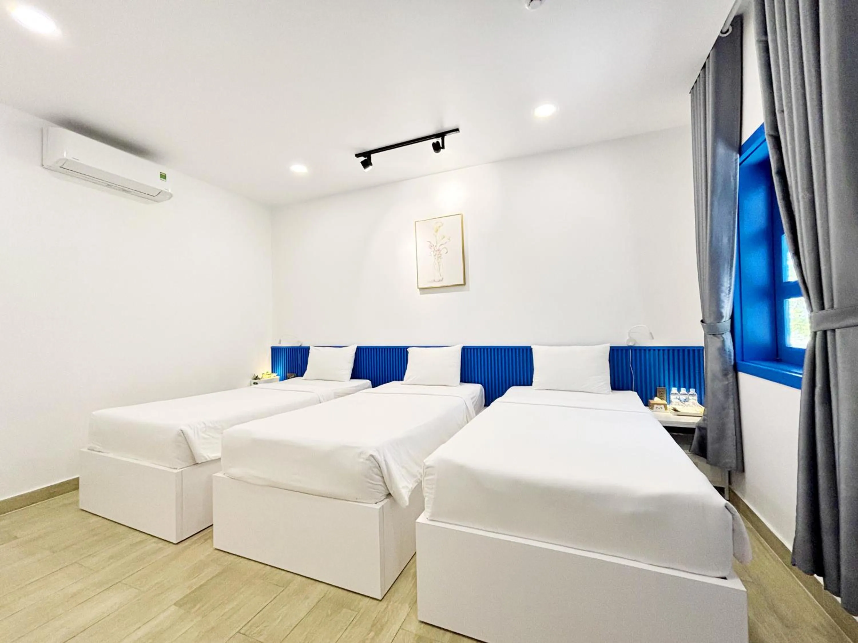 Bed in KIGI Beach Resort