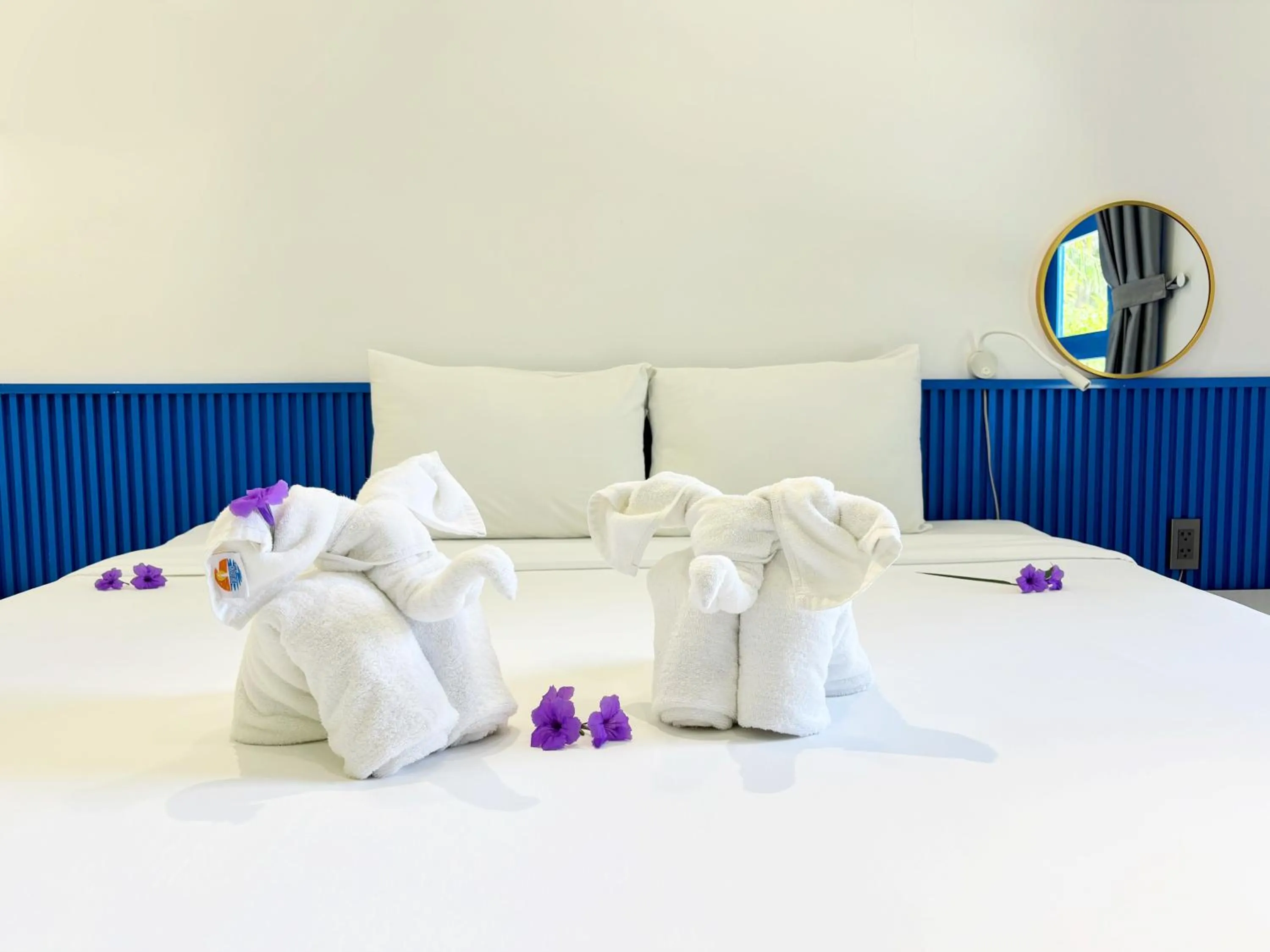 Bed in KIGI Beach Resort