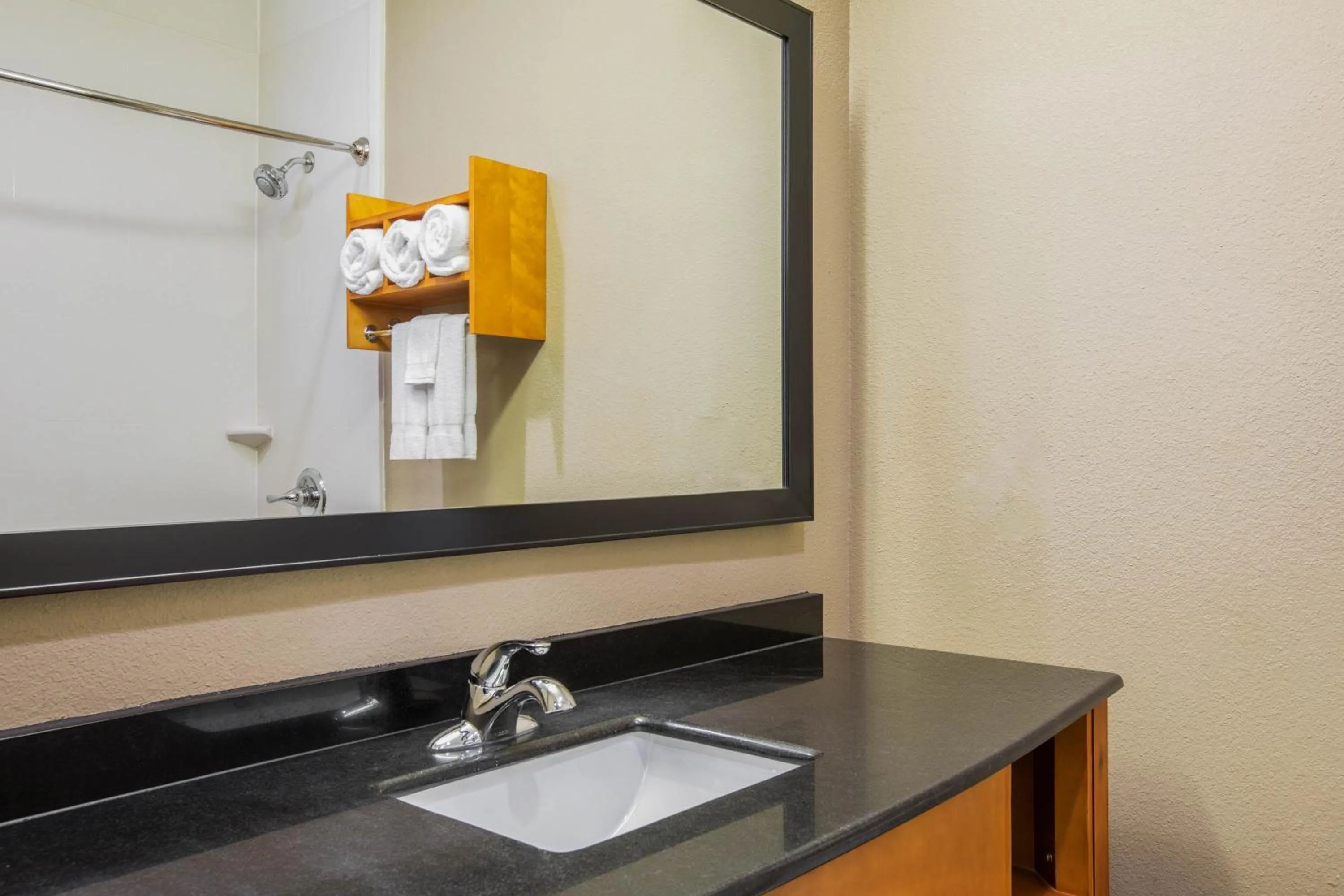 Bathroom in Spark by Hilton Little Rock West