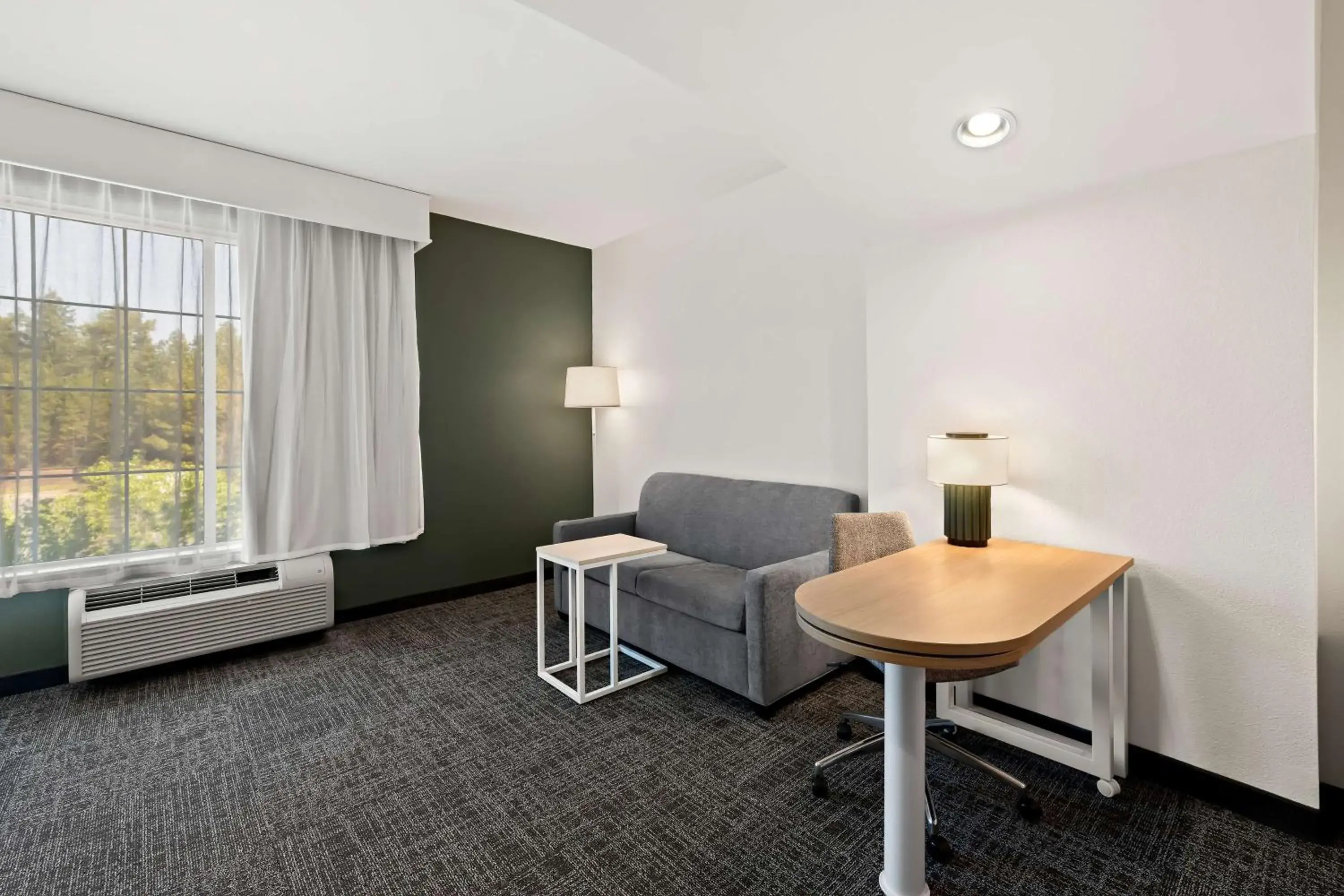 Living room in Spark by Hilton Little Rock West Living room in Spark by Hilton Little Rock West