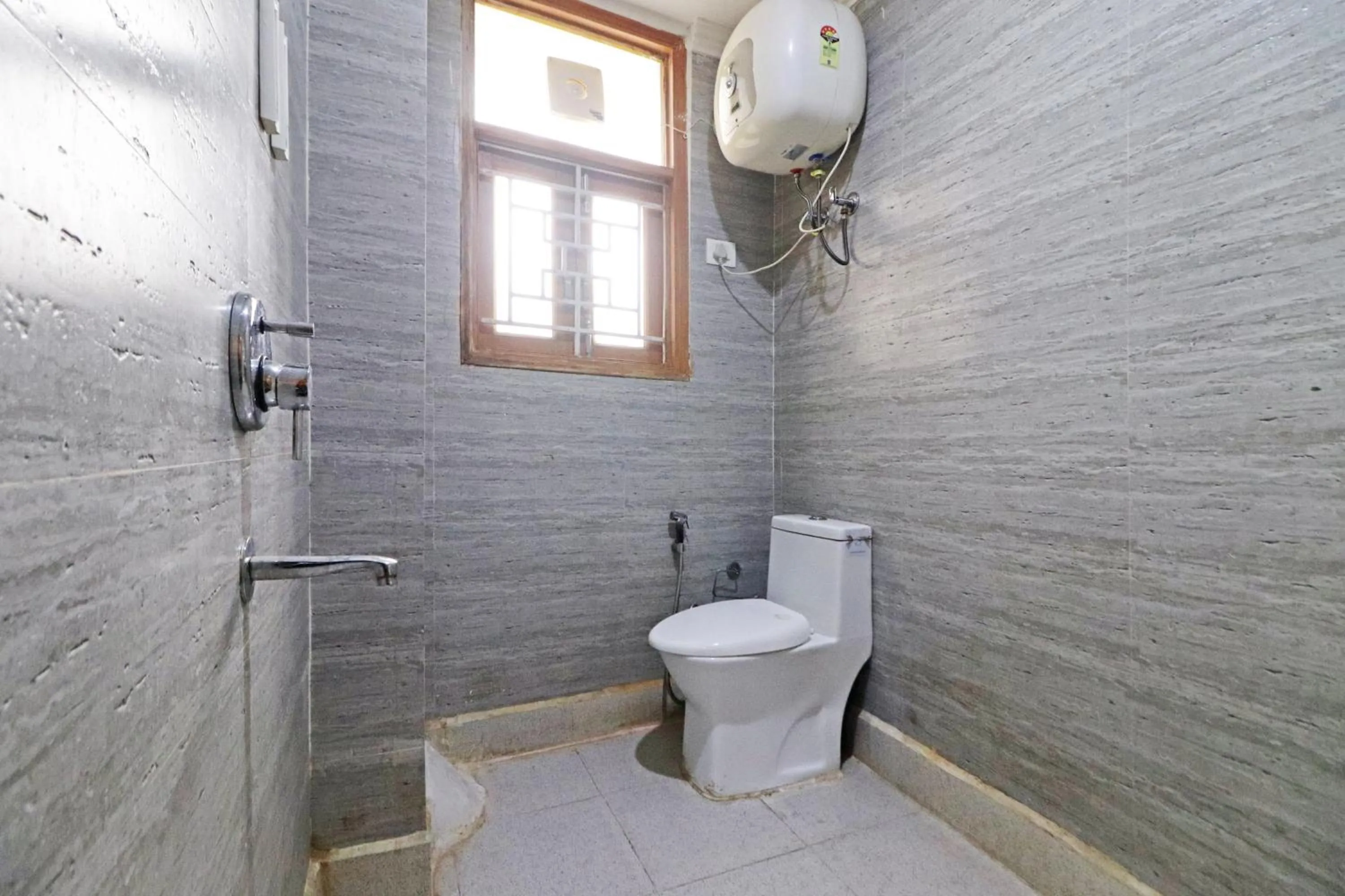 Shower in Mauryan Elite Hotel Chhatarpur Metro Station