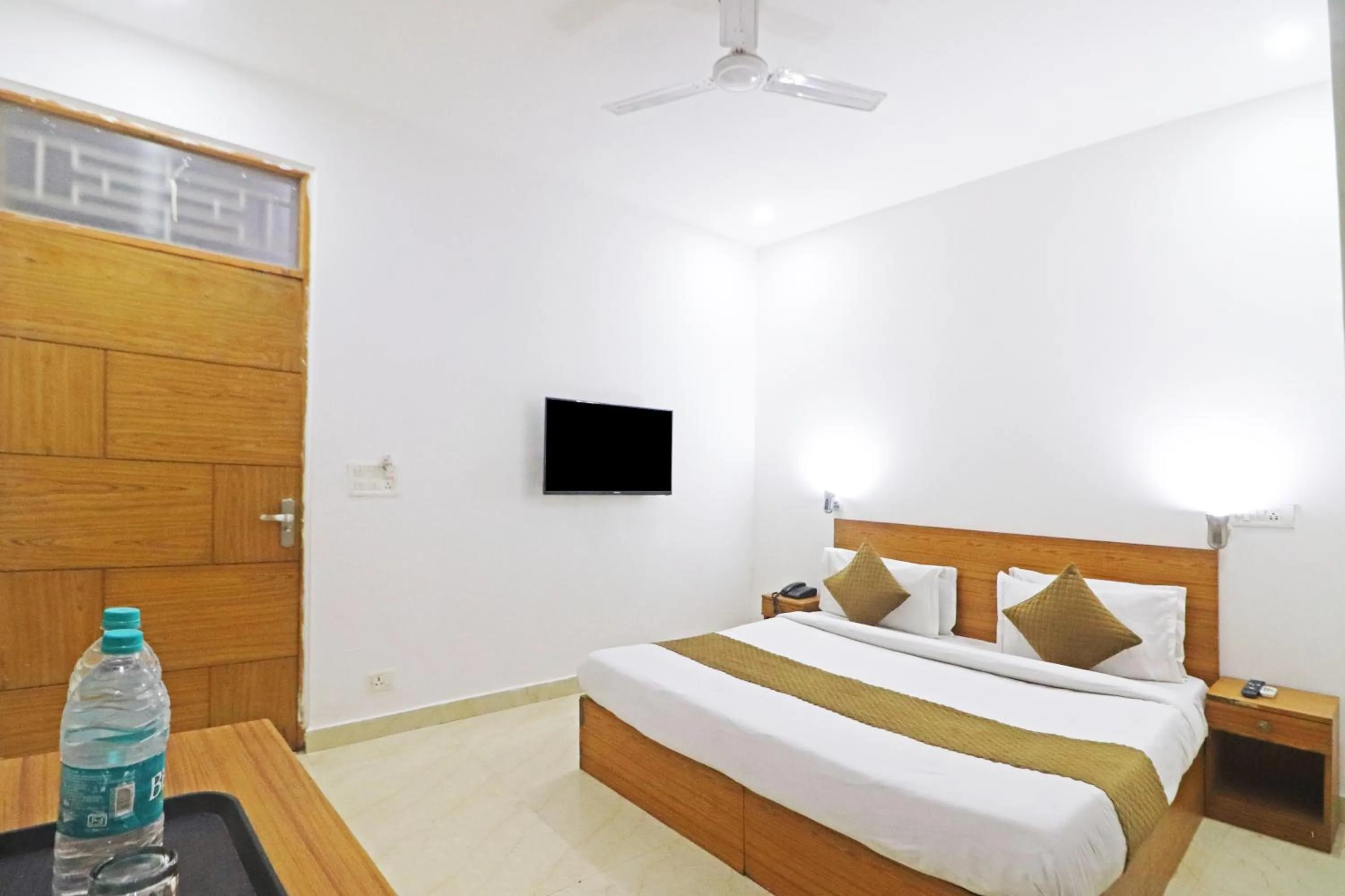 Bed in Mauryan Elite Hotel Chhatarpur Metro Station