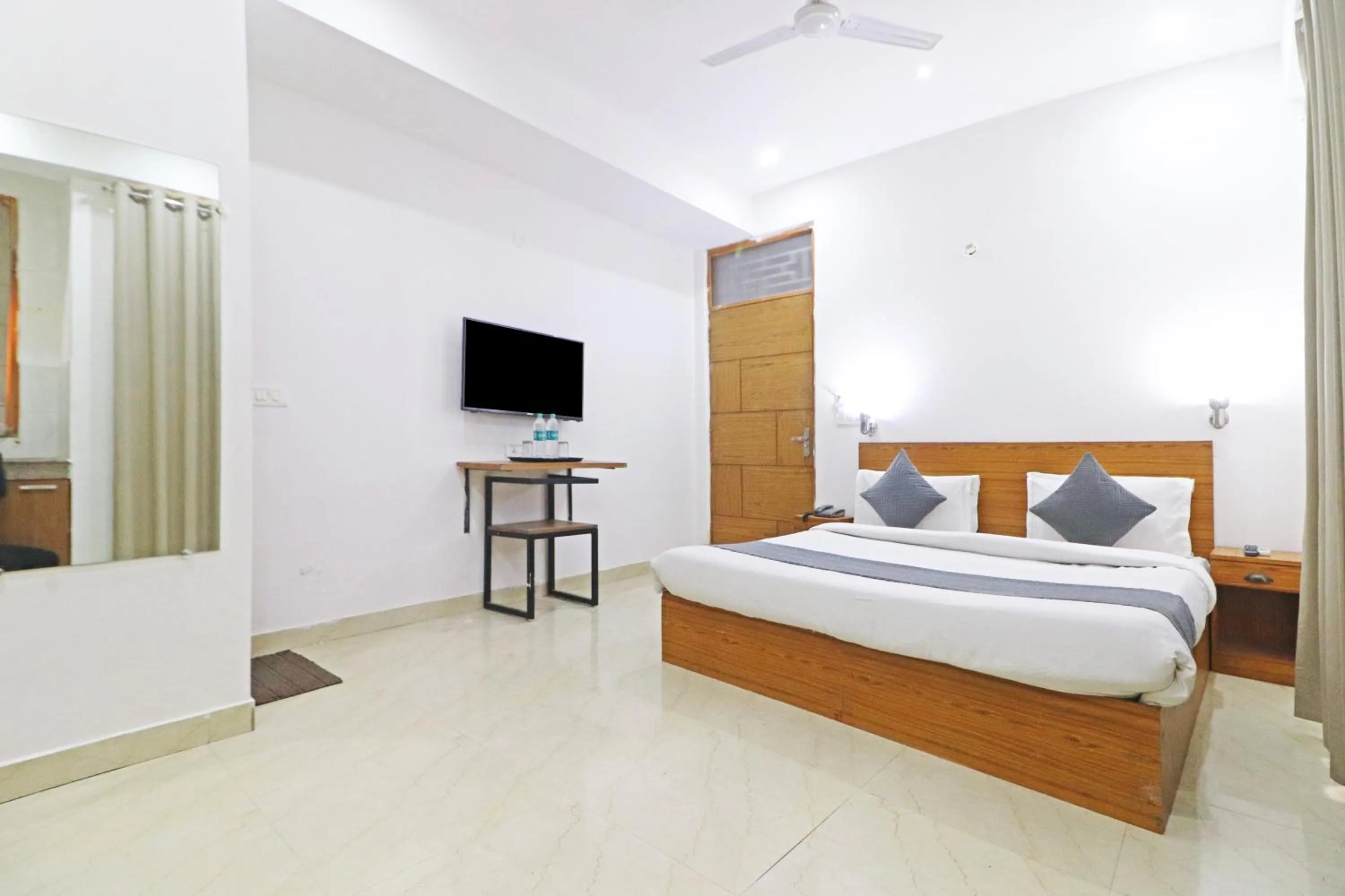 Bed in Mauryan Elite Hotel Chhatarpur Metro Station