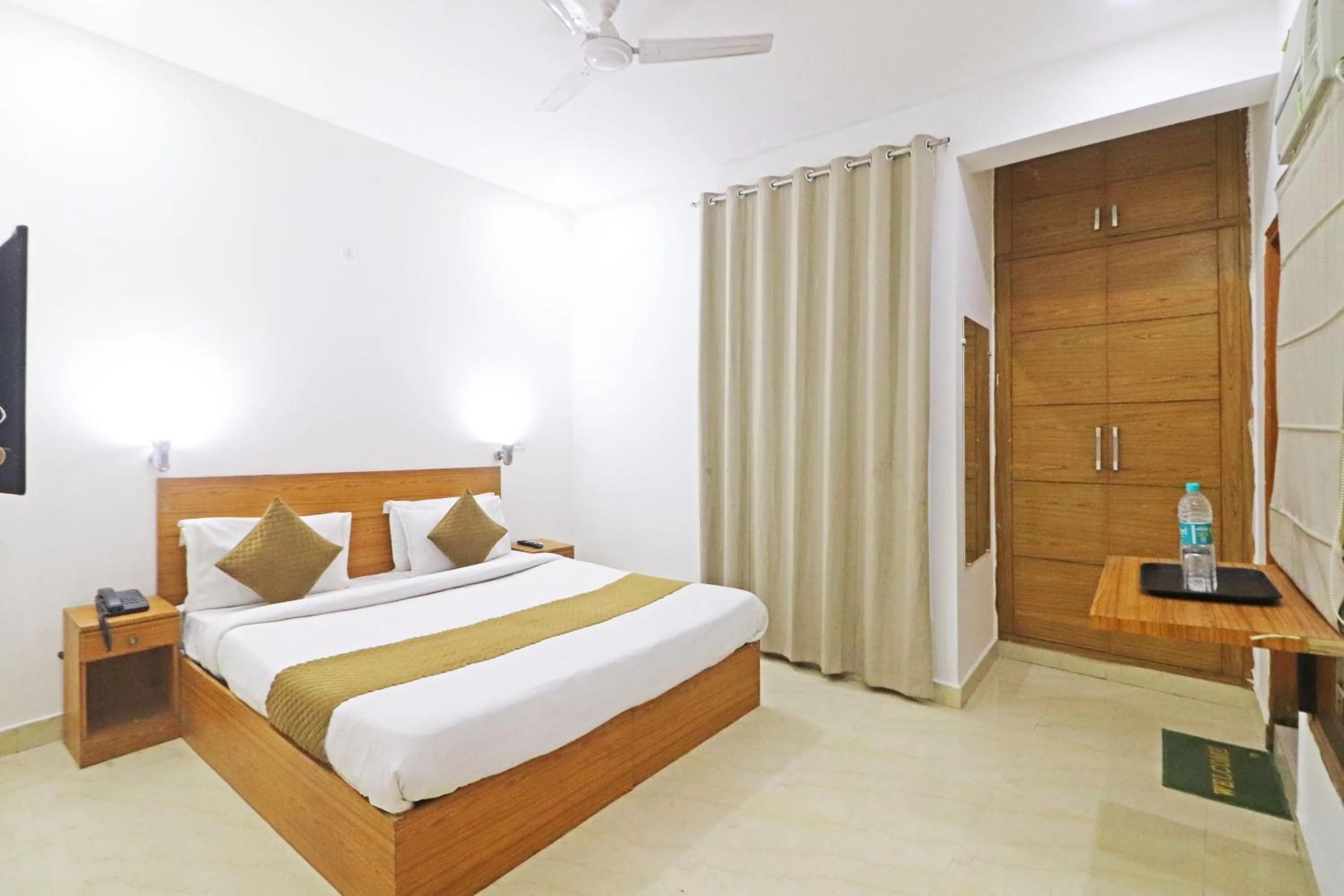 Bed in Mauryan Elite Hotel Chhatarpur Metro Station