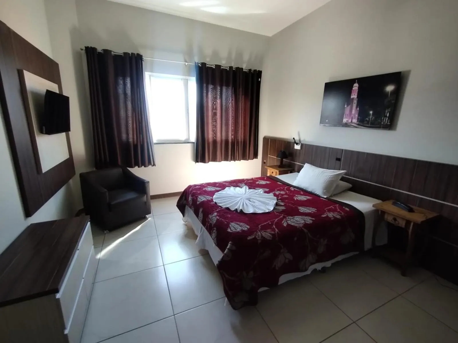 Bed in Miotto Executive Hotel