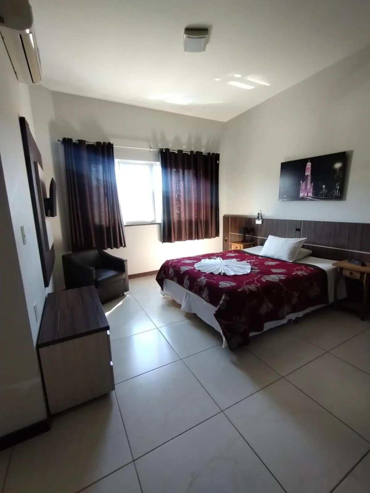 Bed in Miotto Executive Hotel