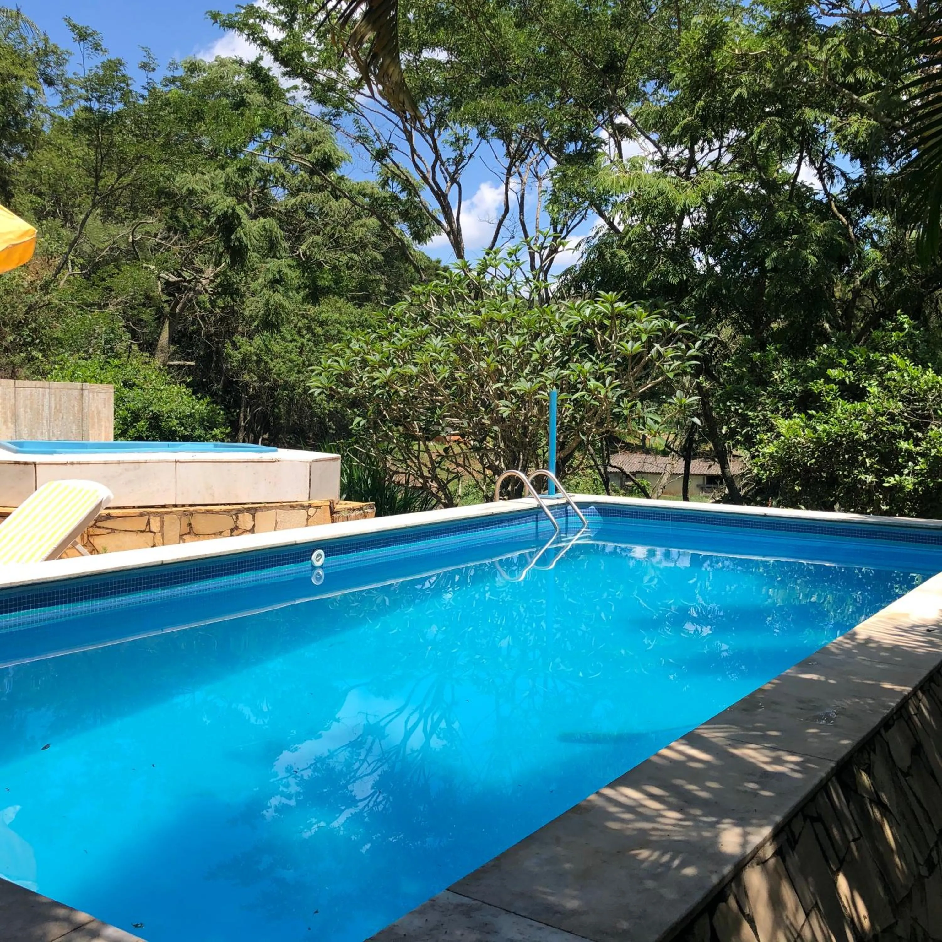 Swimming pool in Fazenda Quinta da Esperança- Pousada e Lazer