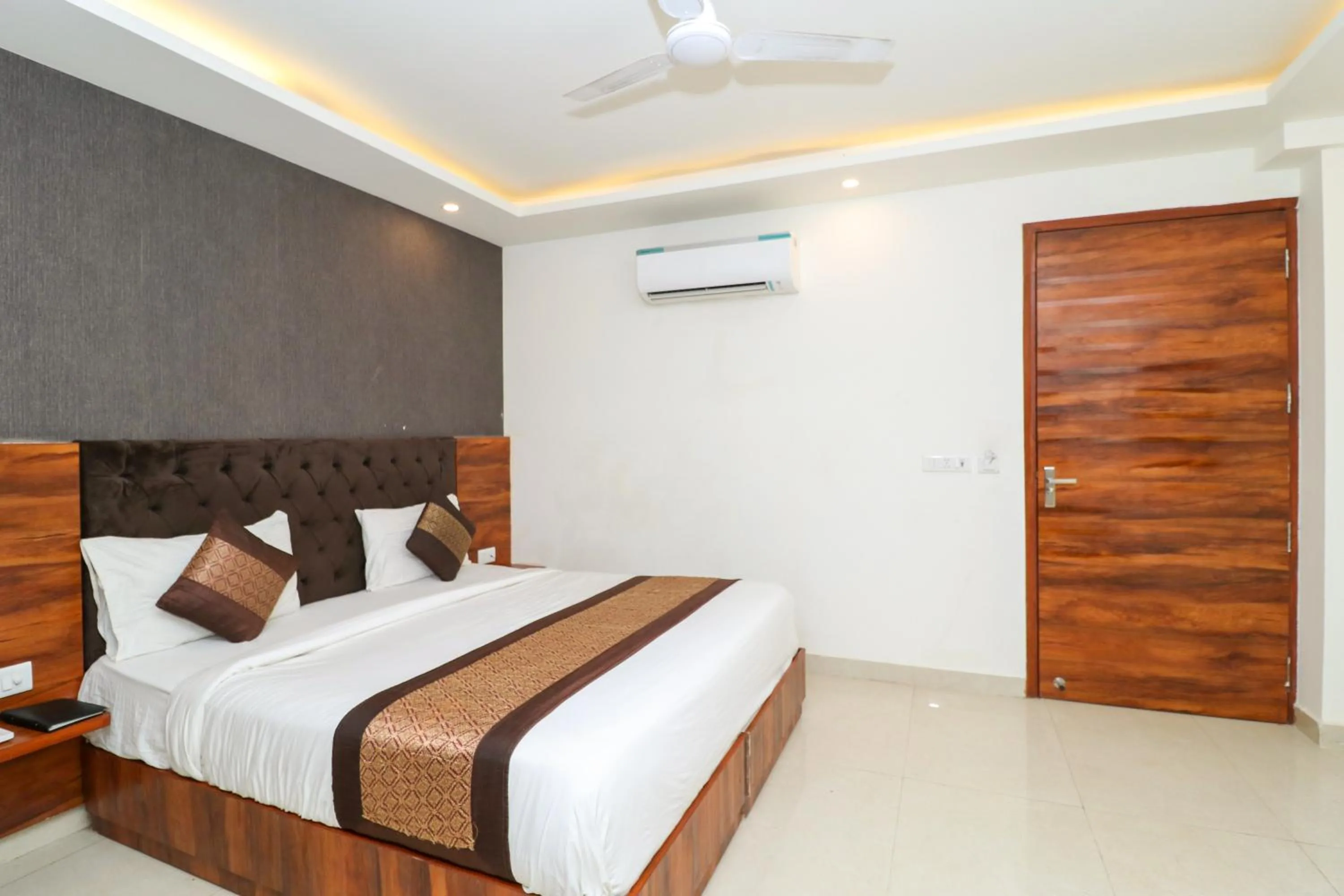 Photo of the whole room, Bed in Hotel Vertu IGI Delhi Airport By OPO,Free Airport Pickup & Drop