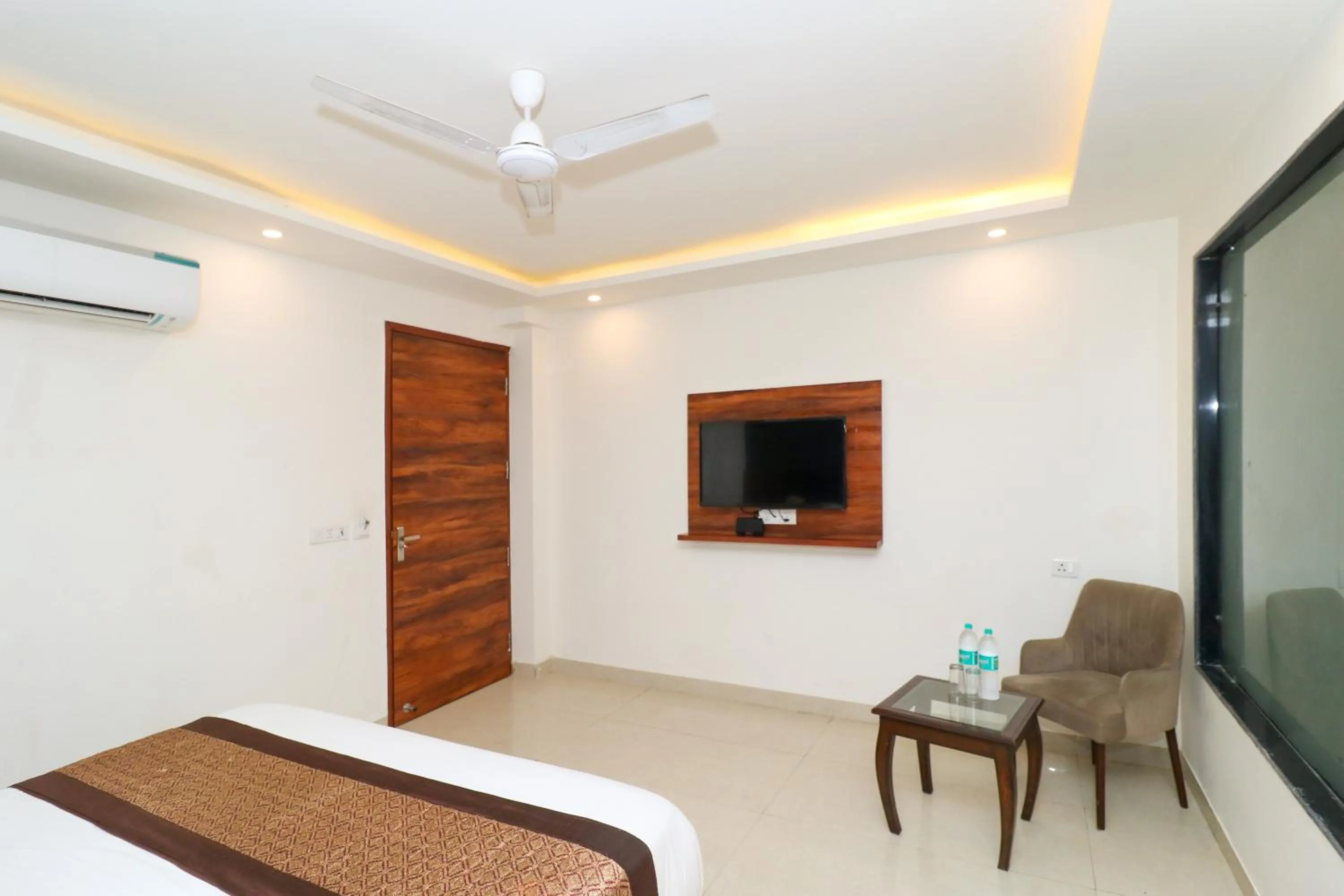 Photo of the whole room, Bed in Hotel Vertu IGI Delhi Airport By OPO,Free Airport Pickup & Drop