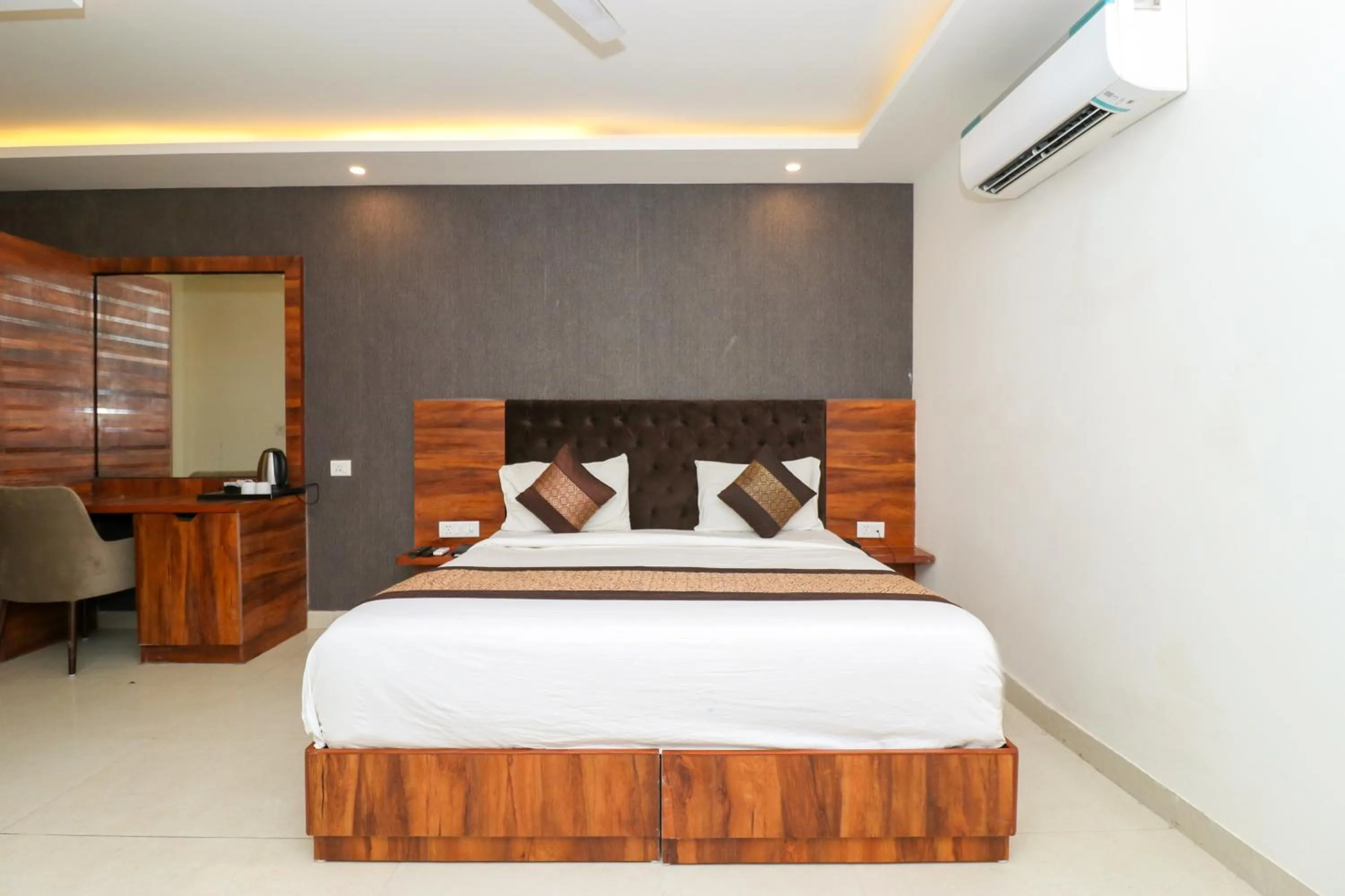 Photo of the whole room, Bed in Hotel Vertu IGI Delhi Airport By OPO,Free Airport Pickup & Drop