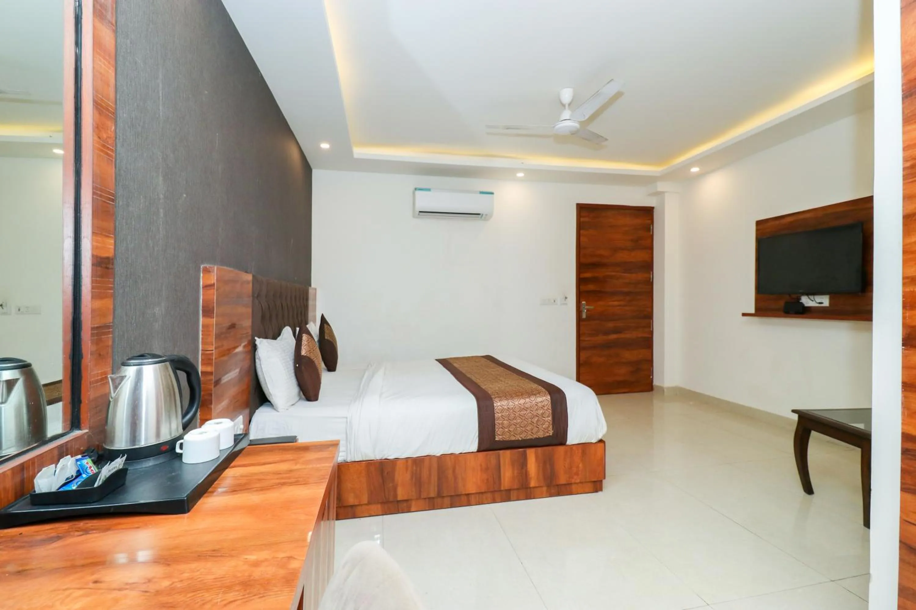 Photo of the whole room, Bed in Hotel Vertu IGI Delhi Airport By OPO,Free Airport Pickup & Drop