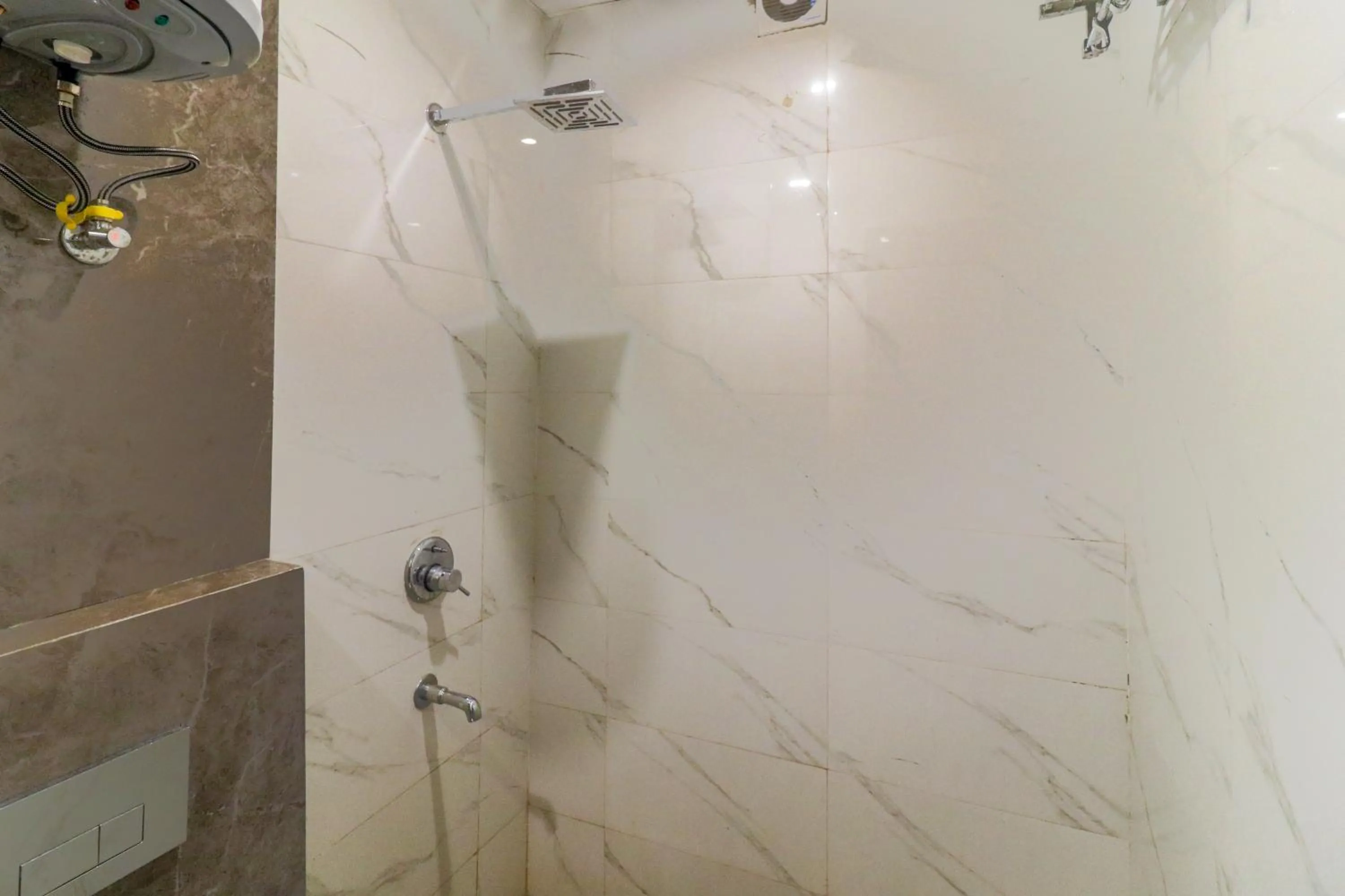 Shower in Hotel Vertu IGI Delhi Airport By OPO,Free Airport Pickup & Drop