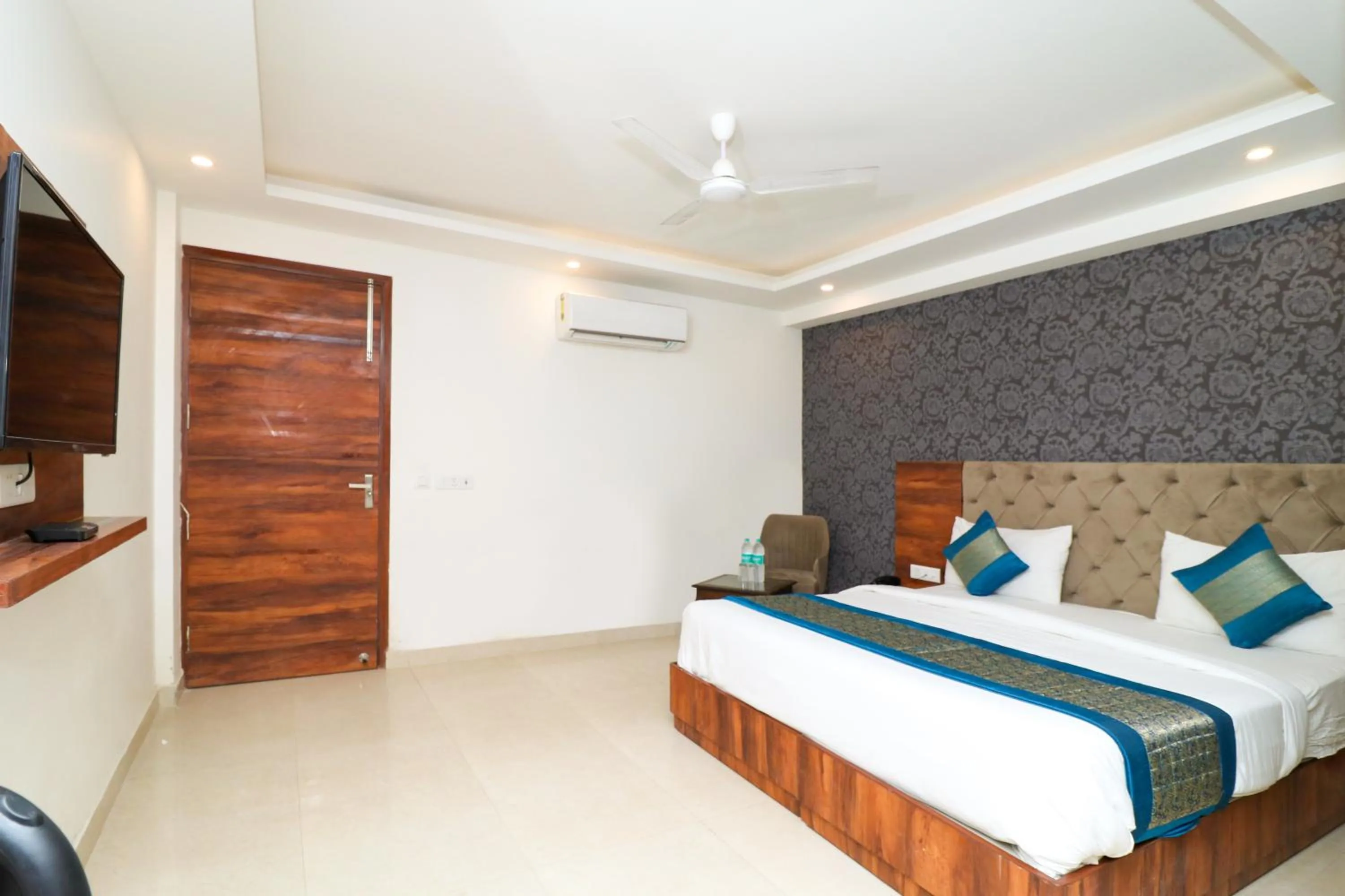 Photo of the whole room, Bed in Hotel Vertu IGI Delhi Airport By OPO,Free Airport Pickup & Drop