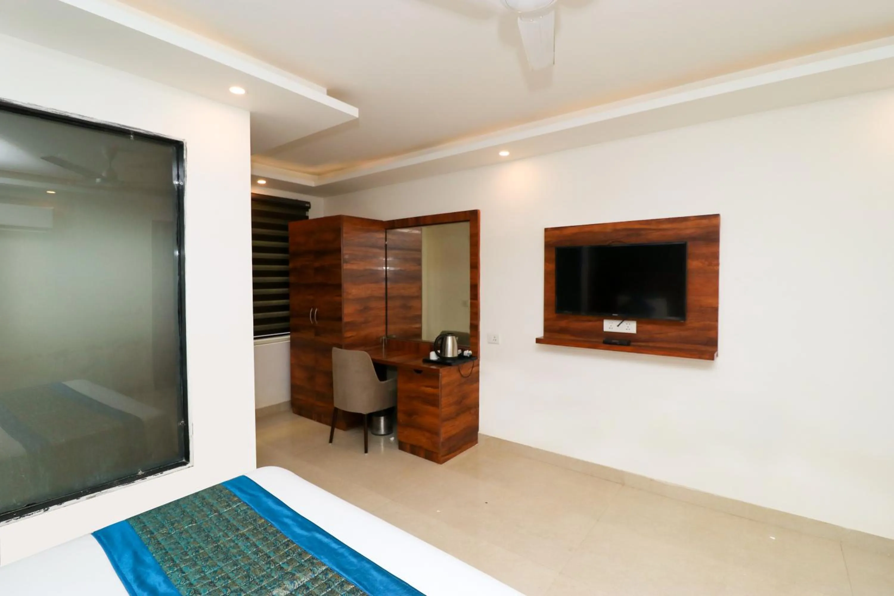 Photo of the whole room in Hotel Vertu IGI Delhi Airport By OPO,Free Airport Pickup & Drop