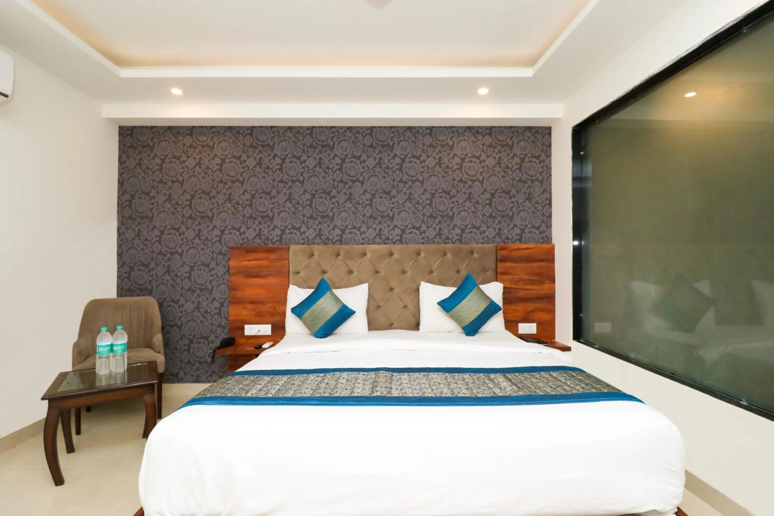 Photo of the whole room, Bed in Hotel Vertu IGI Delhi Airport By OPO,Free Airport Pickup & Drop