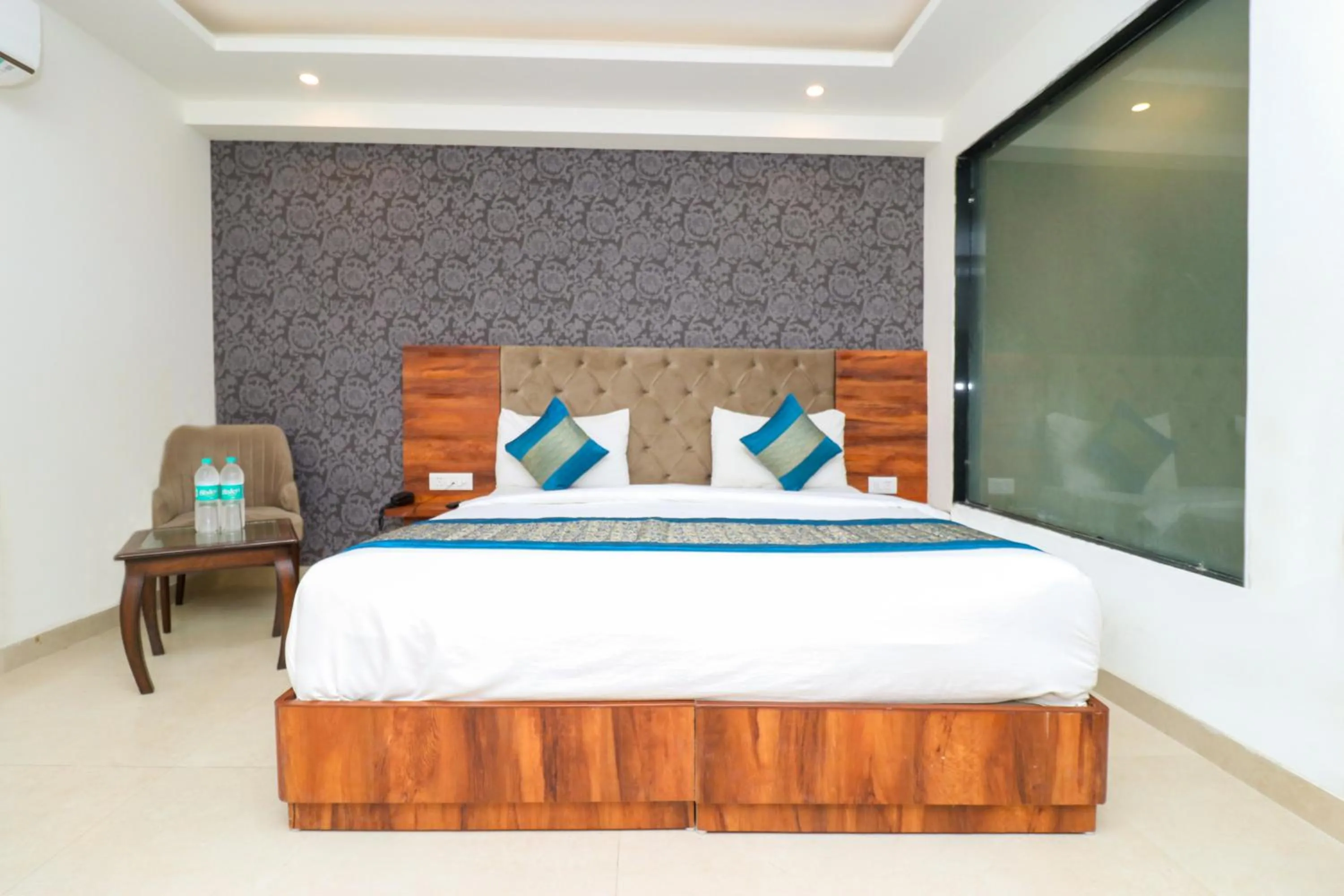 Photo of the whole room, Bed in Hotel Vertu IGI Delhi Airport By OPO,Free Airport Pickup & Drop