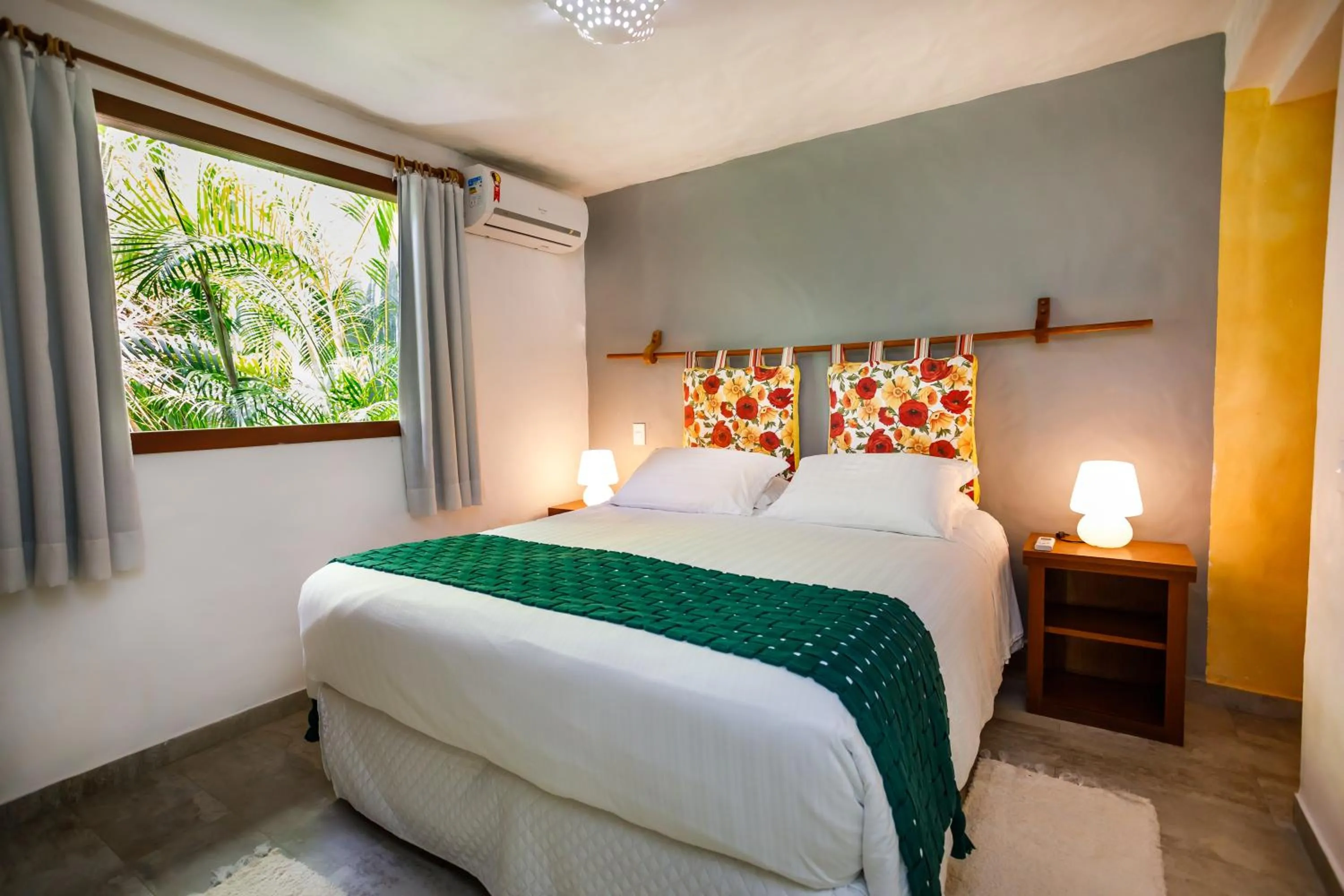 Bed in Pousada Rigatoni