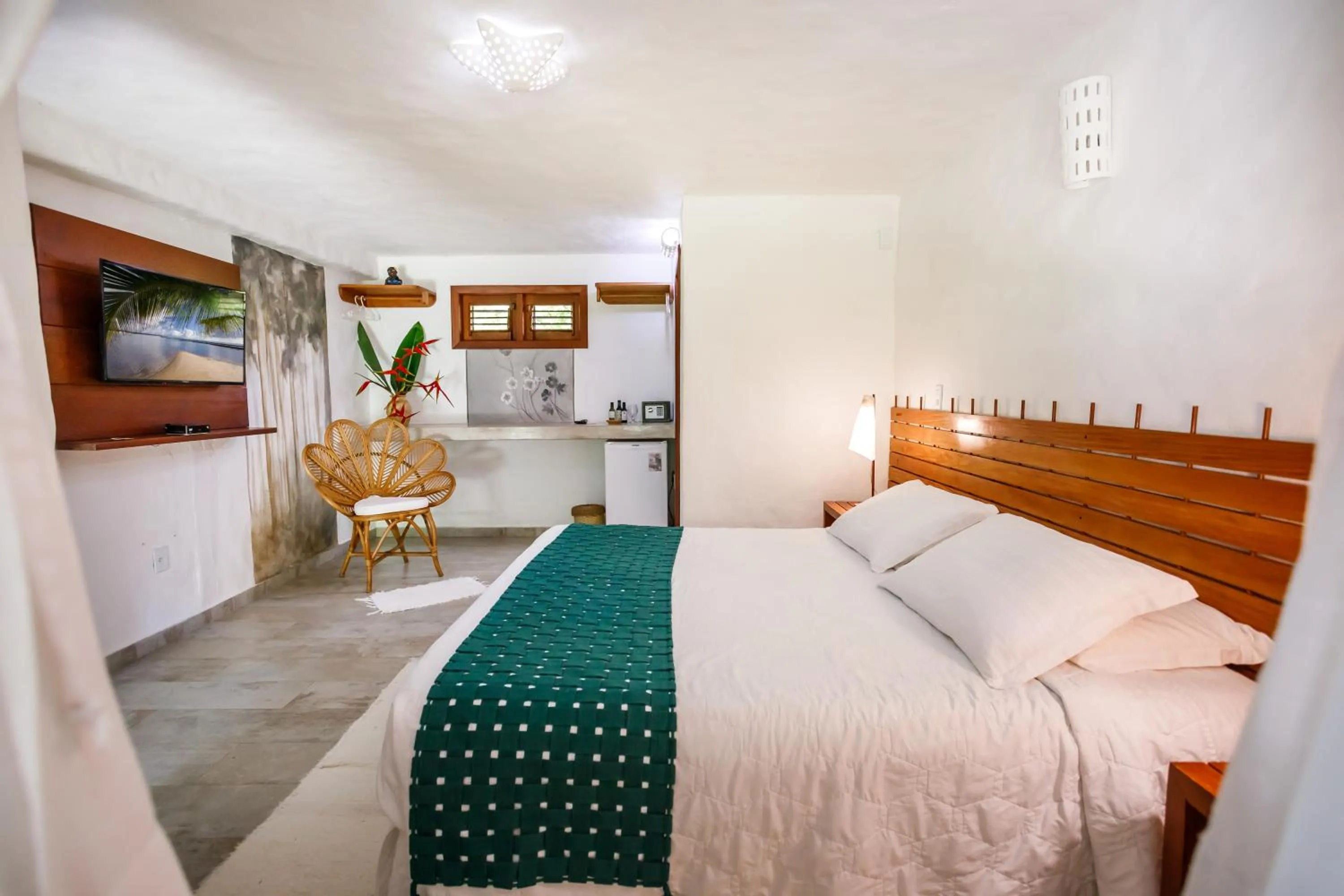 Bed in Pousada Rigatoni