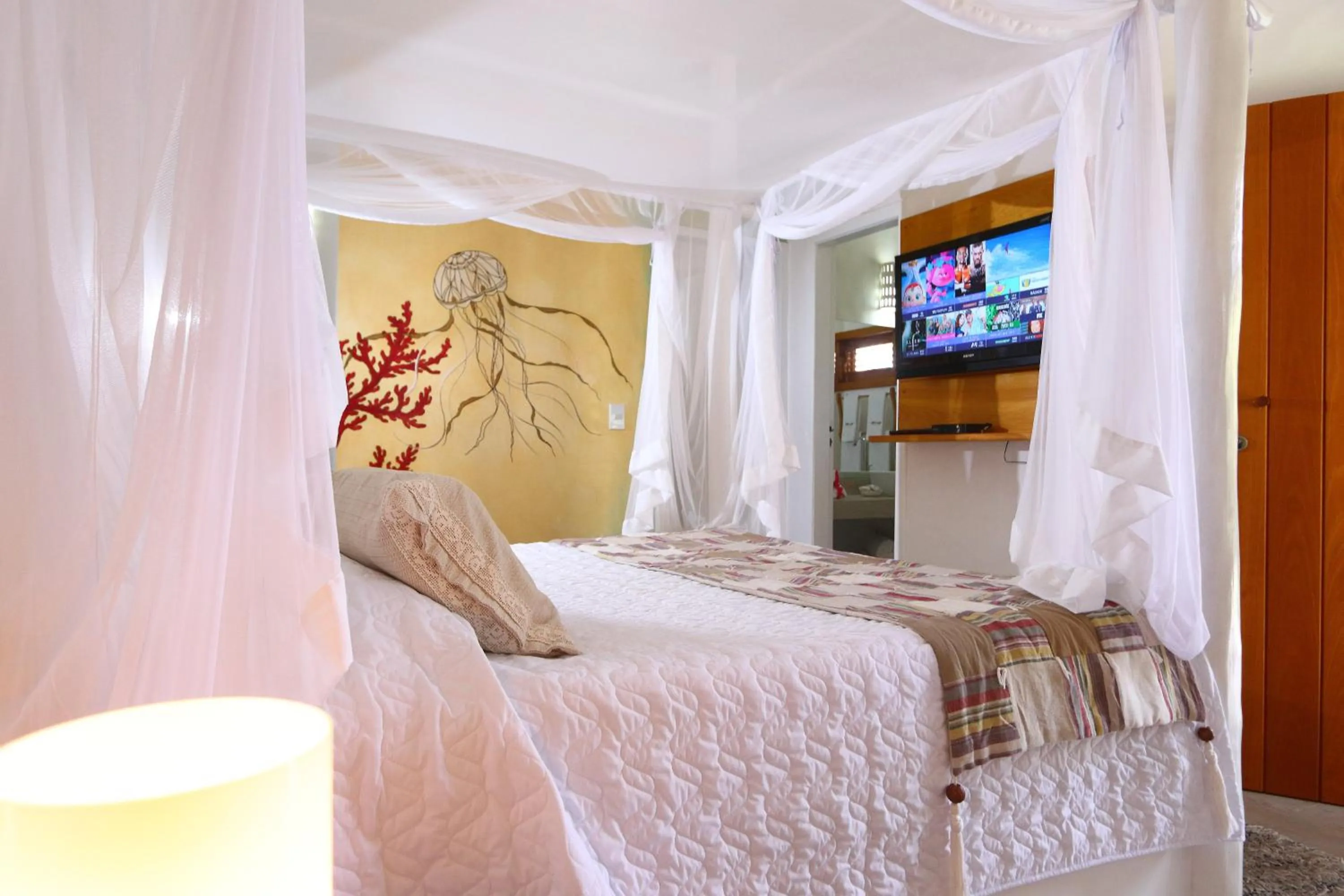 Bed in Pousada Rigatoni