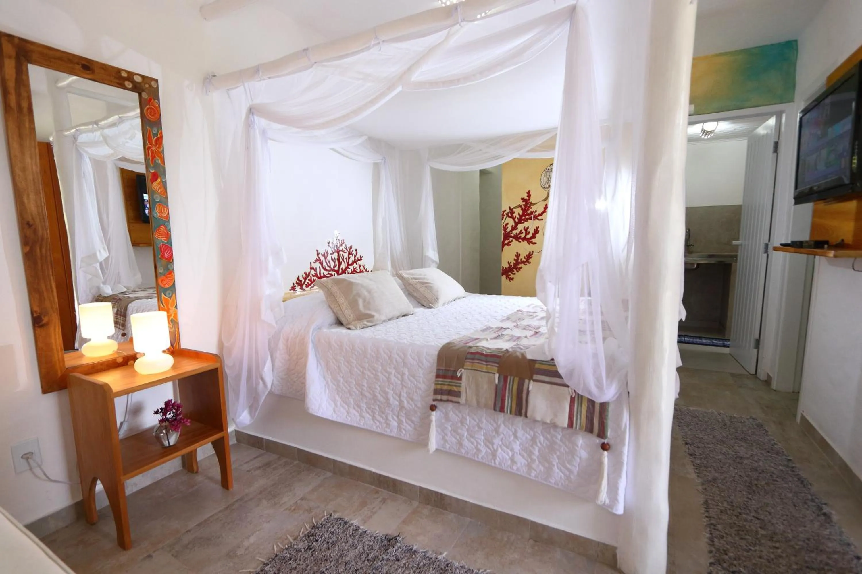 Bed in Pousada Rigatoni