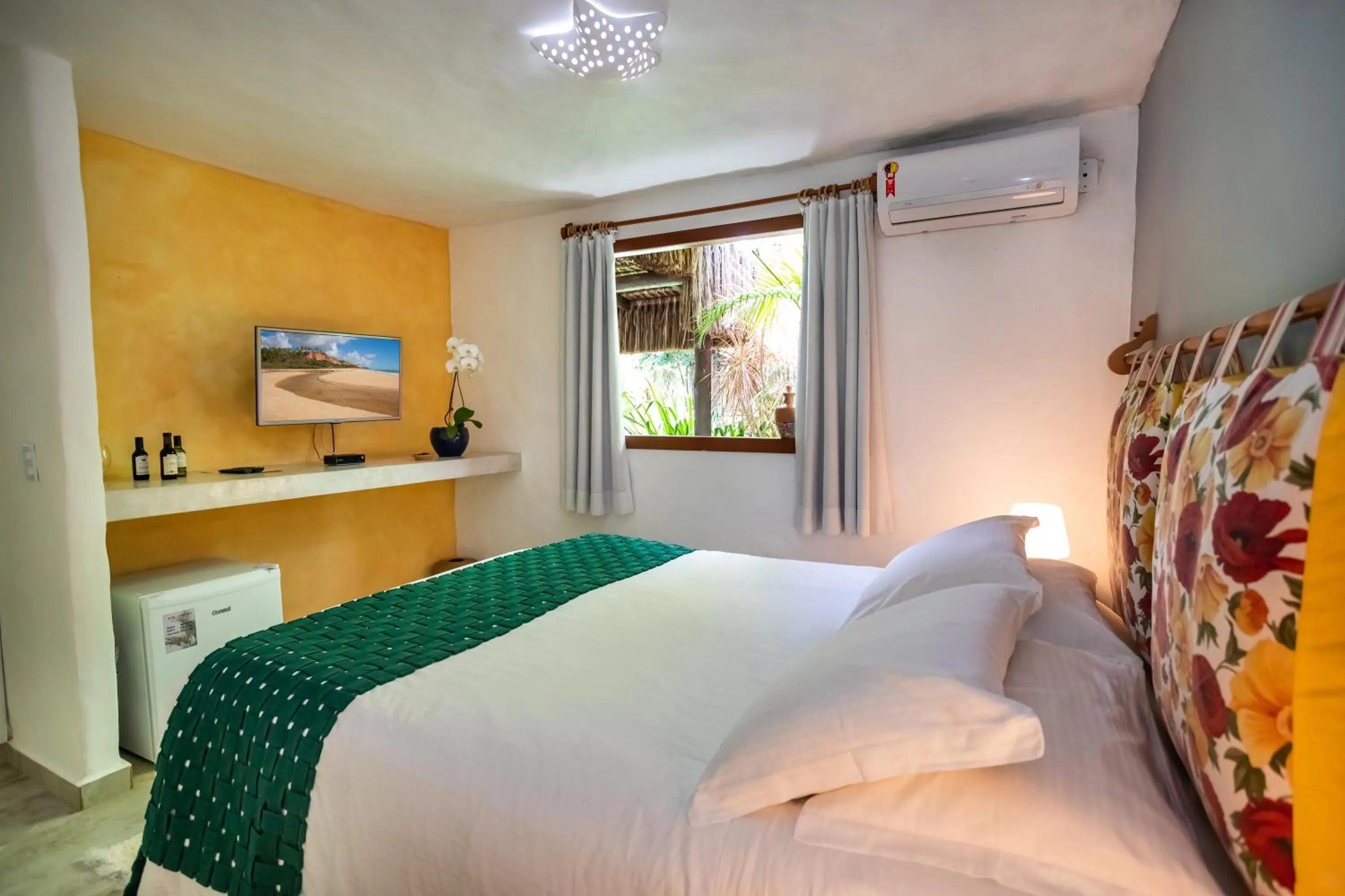 Bed in Pousada Rigatoni