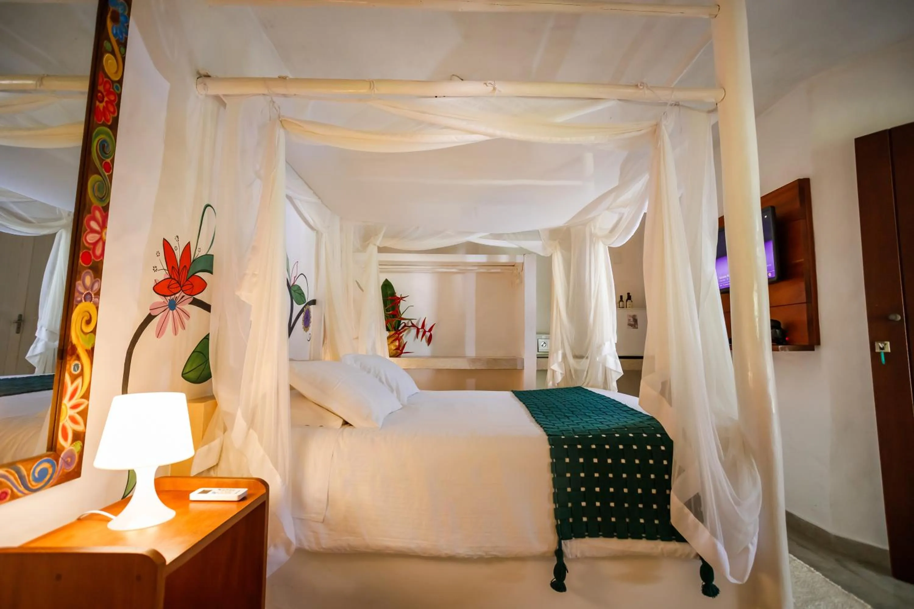 Bed in Pousada Rigatoni