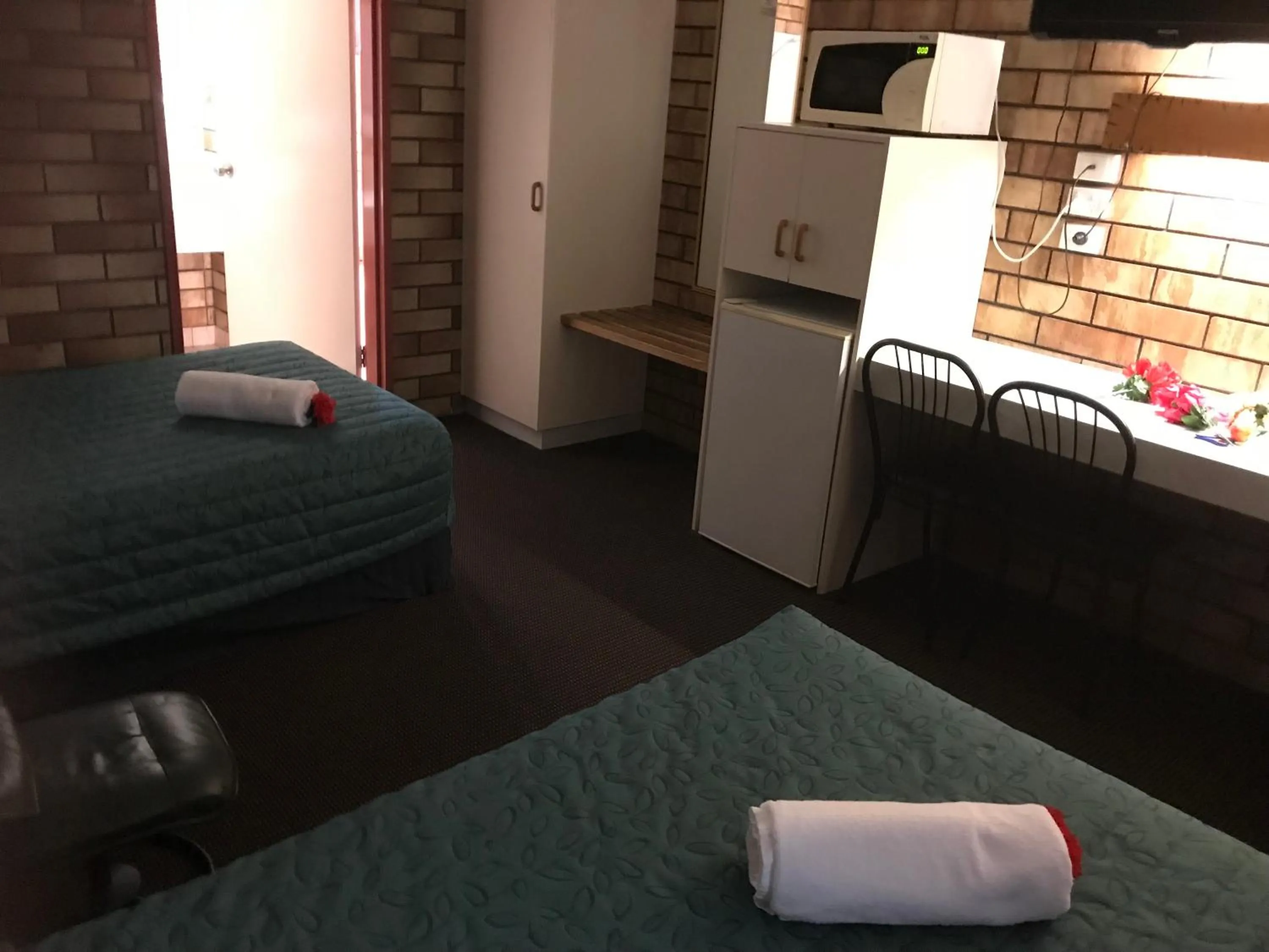 Bed in Miles Outback Motel