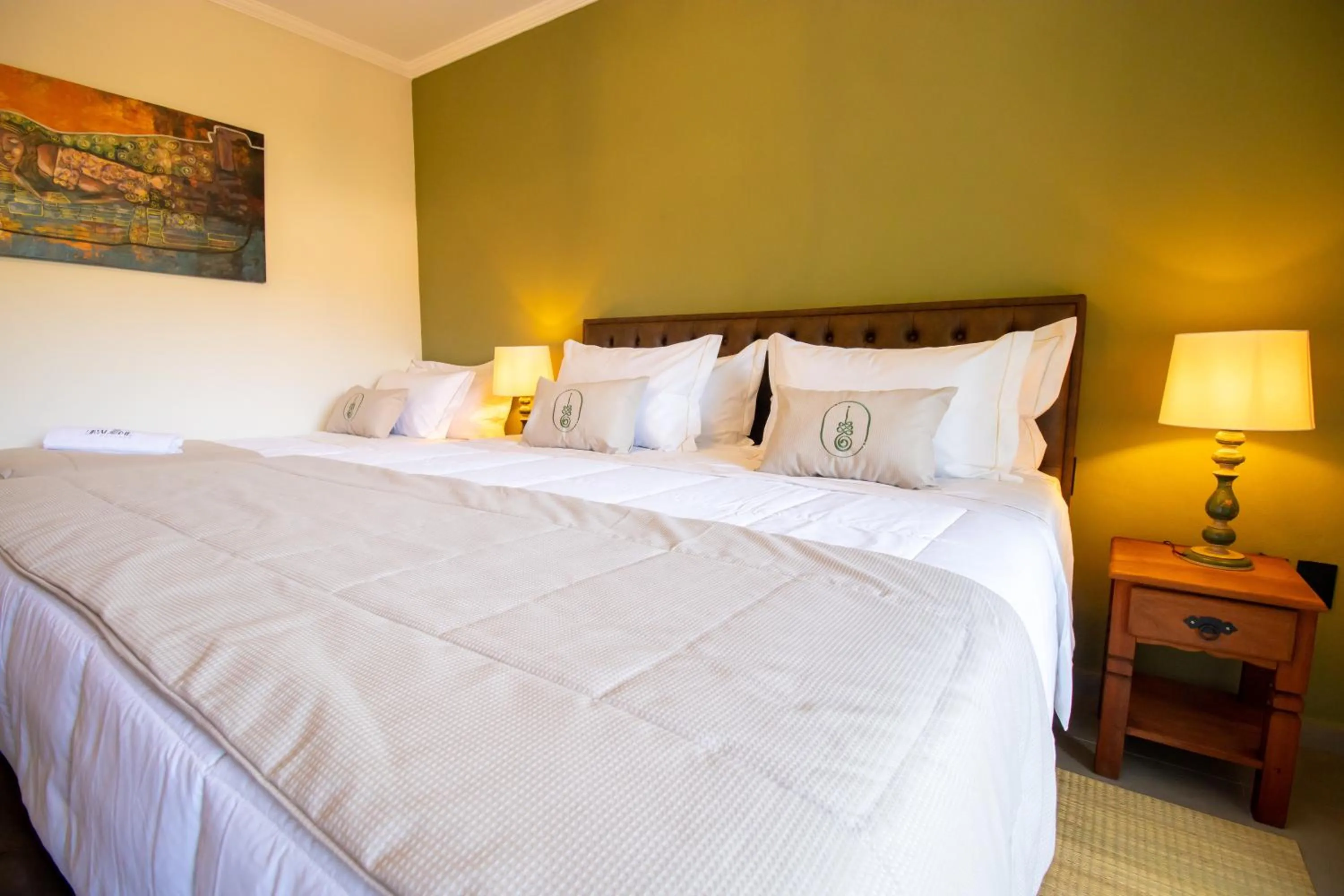 Bed in Unalome Pousada