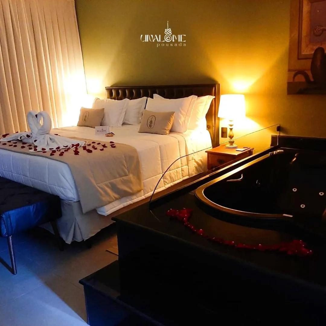 Bed in Unalome Pousada