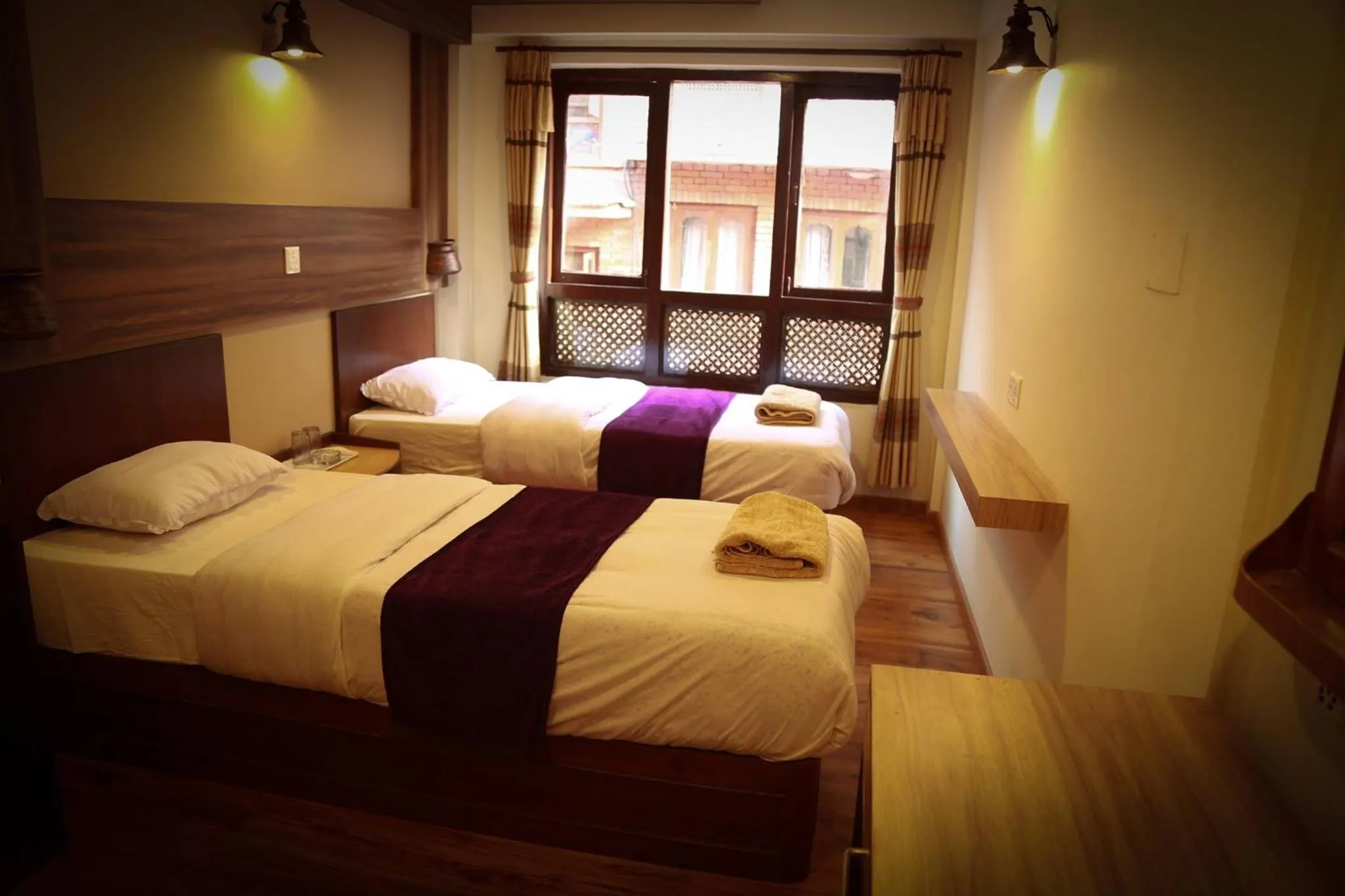 Bed in Kumari Guest House