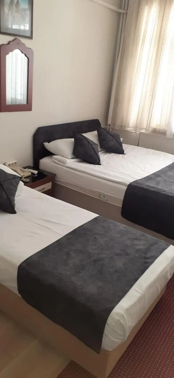 Bed in AKÇAY LEMAN OTEL