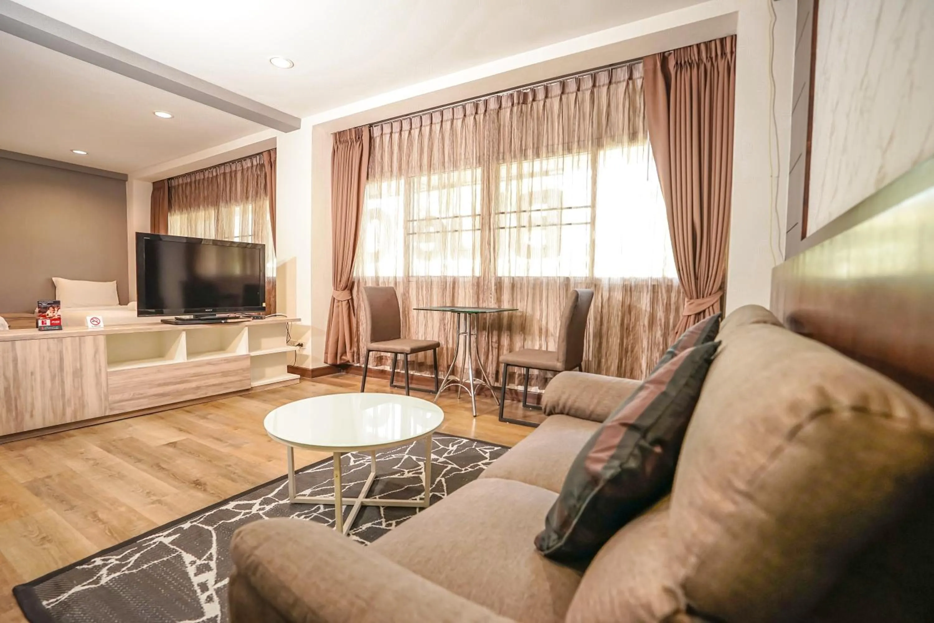 Seating area in Blue cafe Apartments