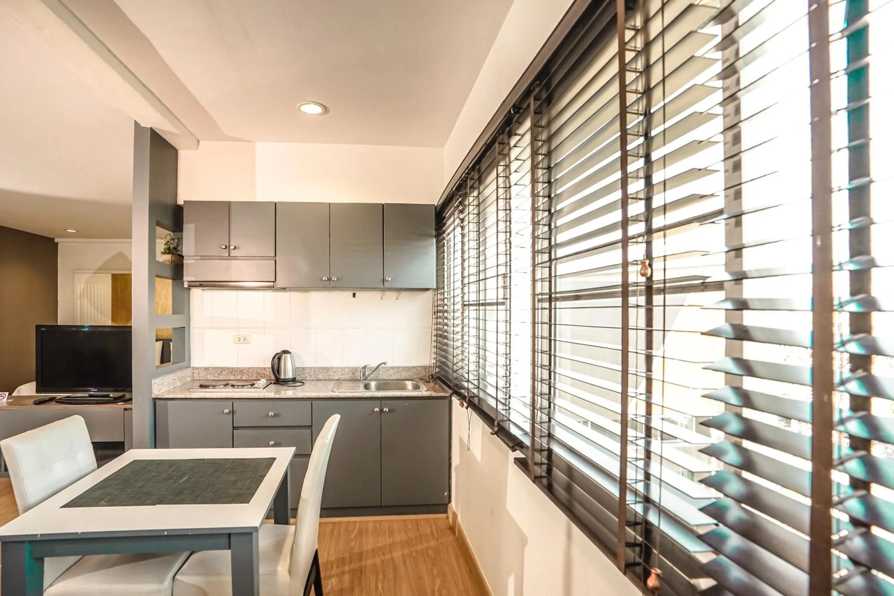 Photo of the whole room in Blue cafe Apartments