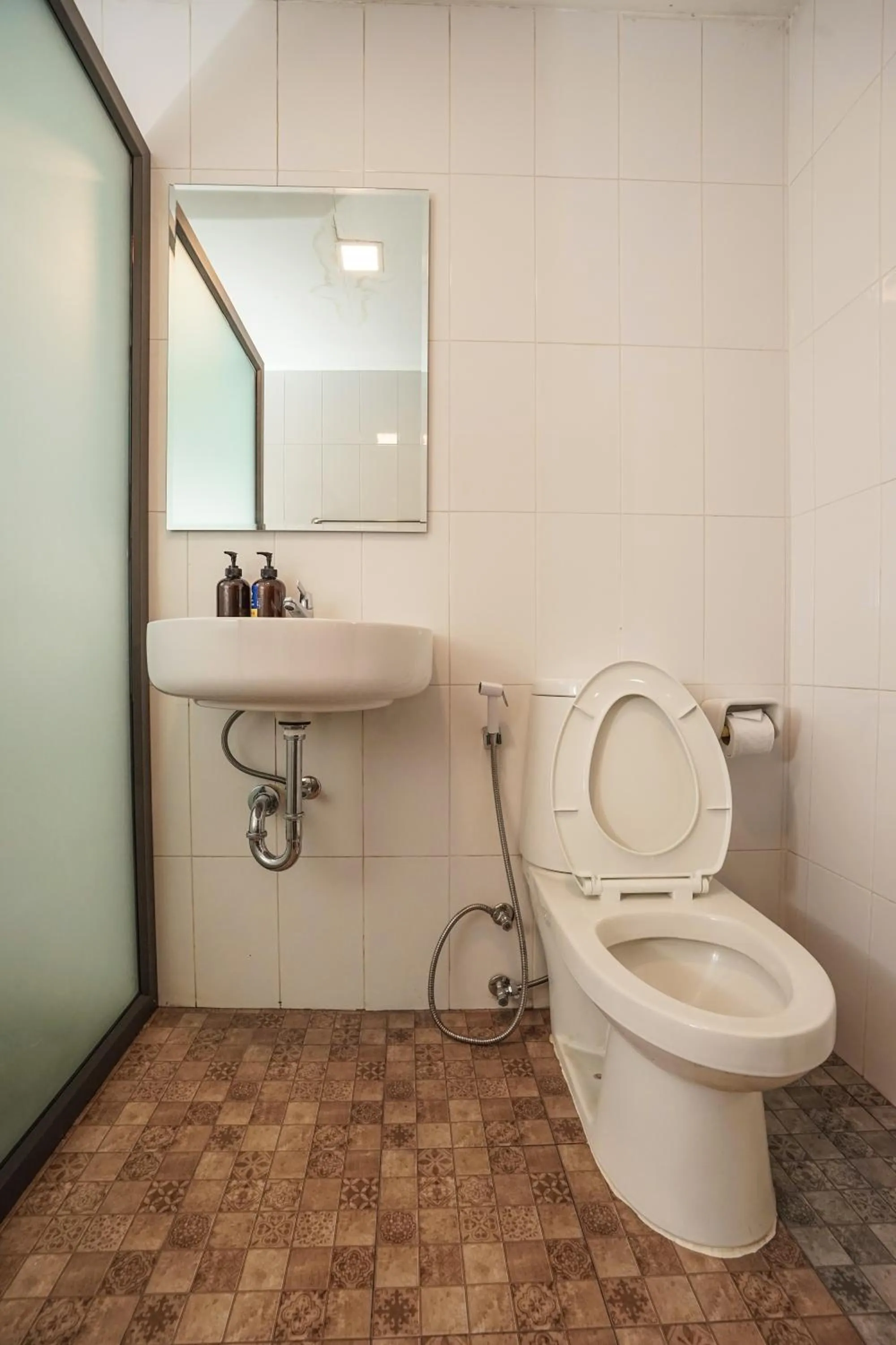 Toilet in Blue cafe Apartments